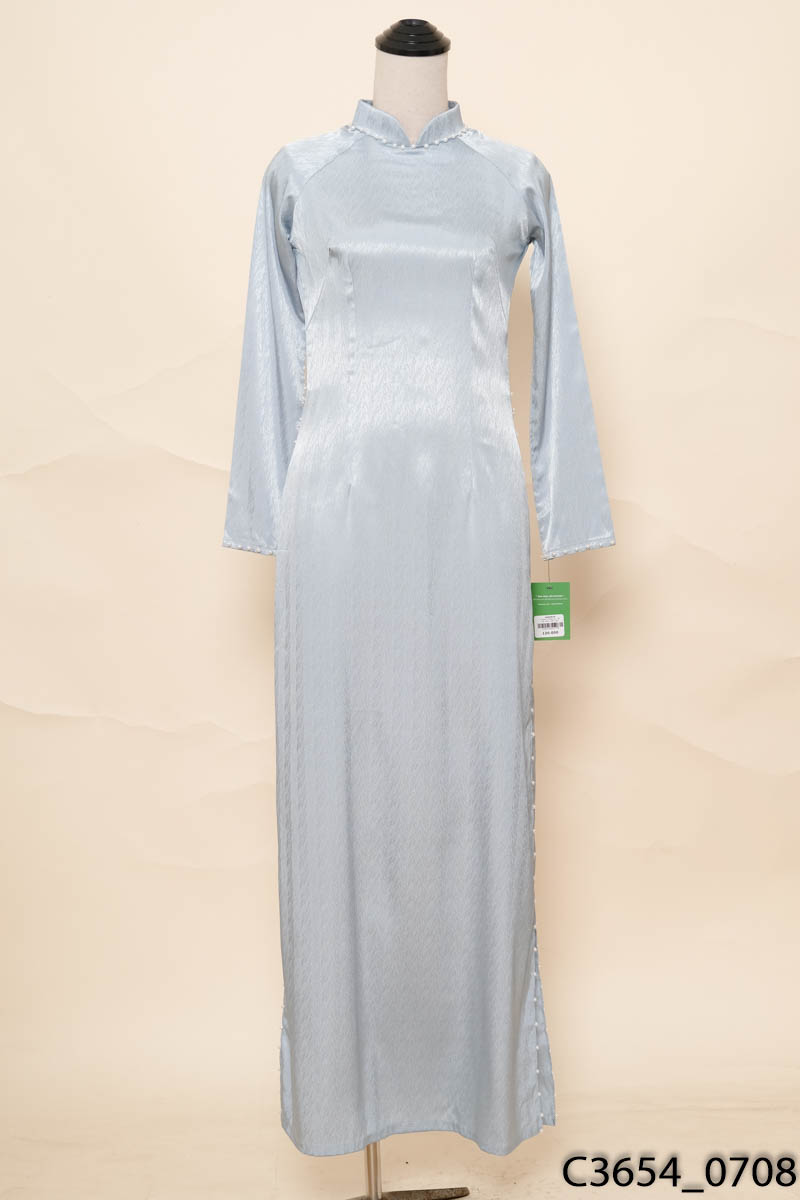 Áo dài xanh viền ngọc