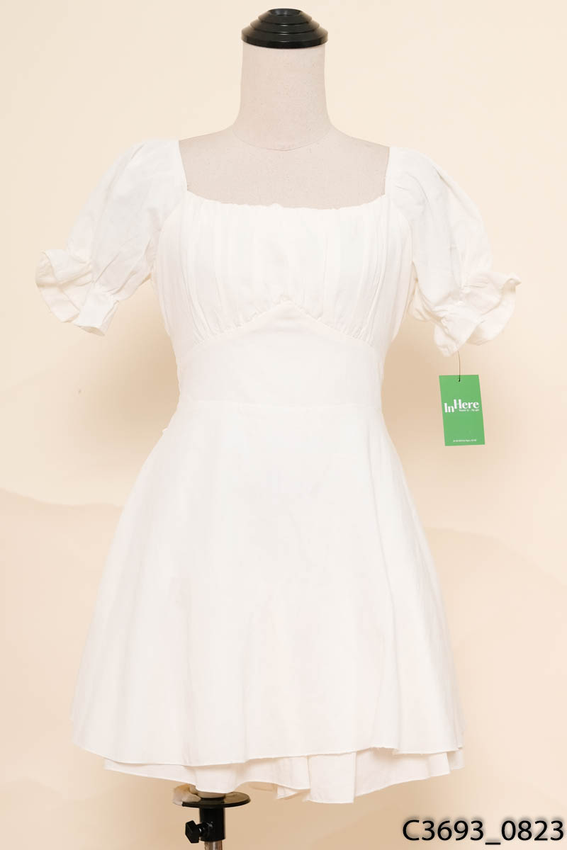 Đầm trắng tay bồng
