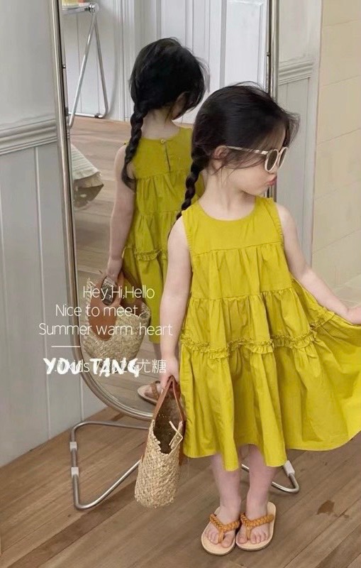 Váy xn xòe tầng xanh cốm bg