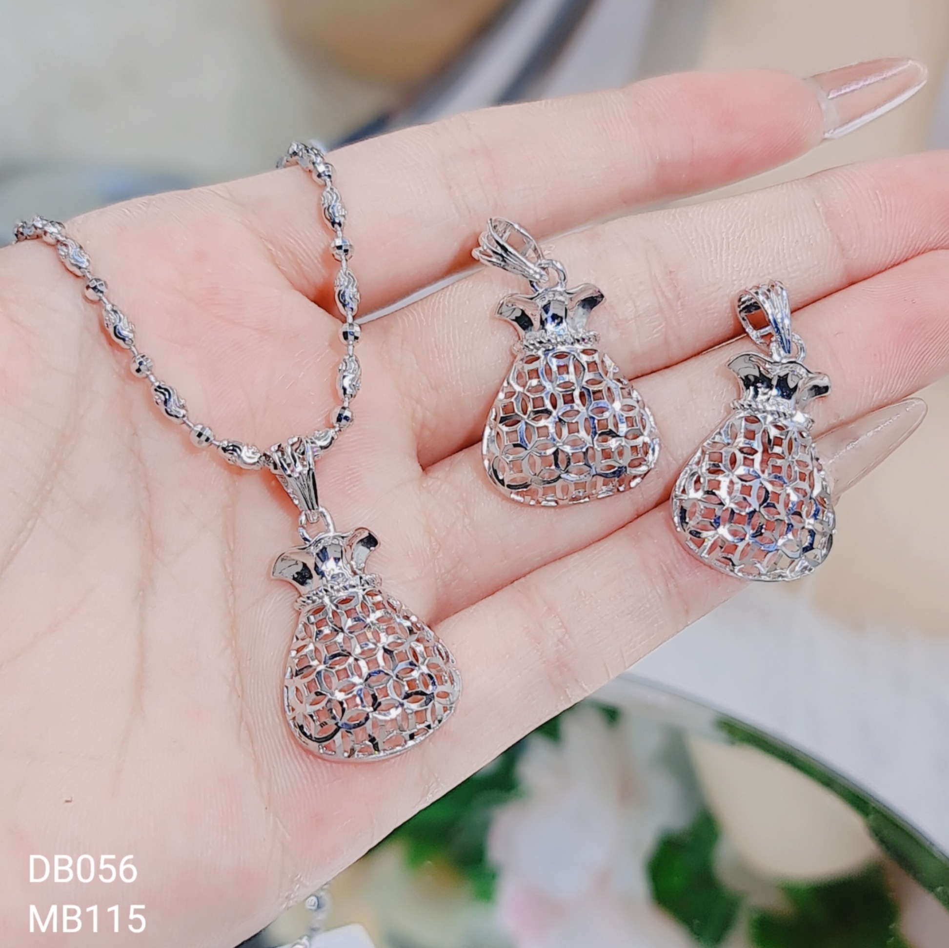 MẶT TÚI TIỀN KIM TIỀN