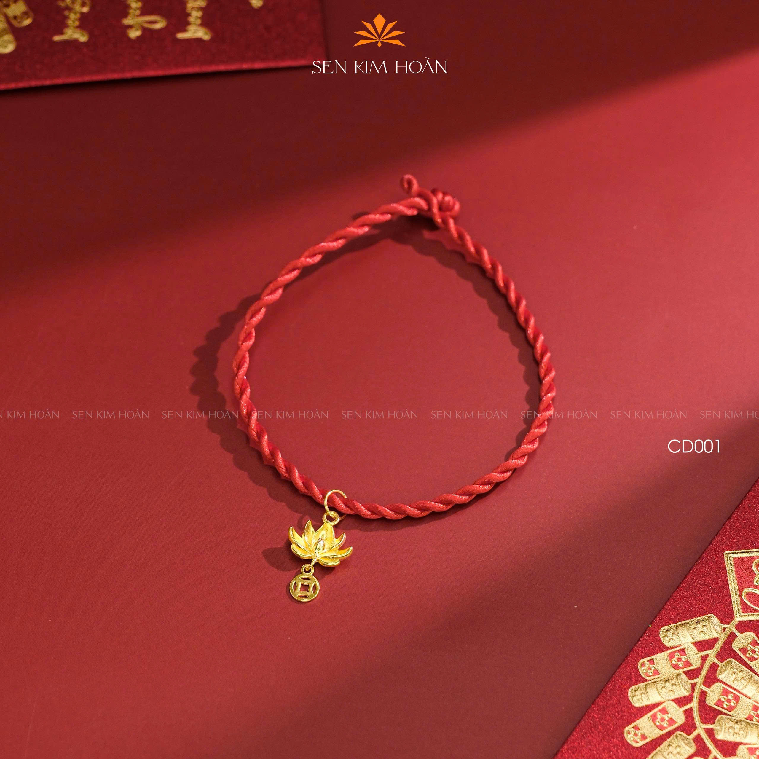 Vòng chỉ đỏ charm liên hoa kim tiền - CD001