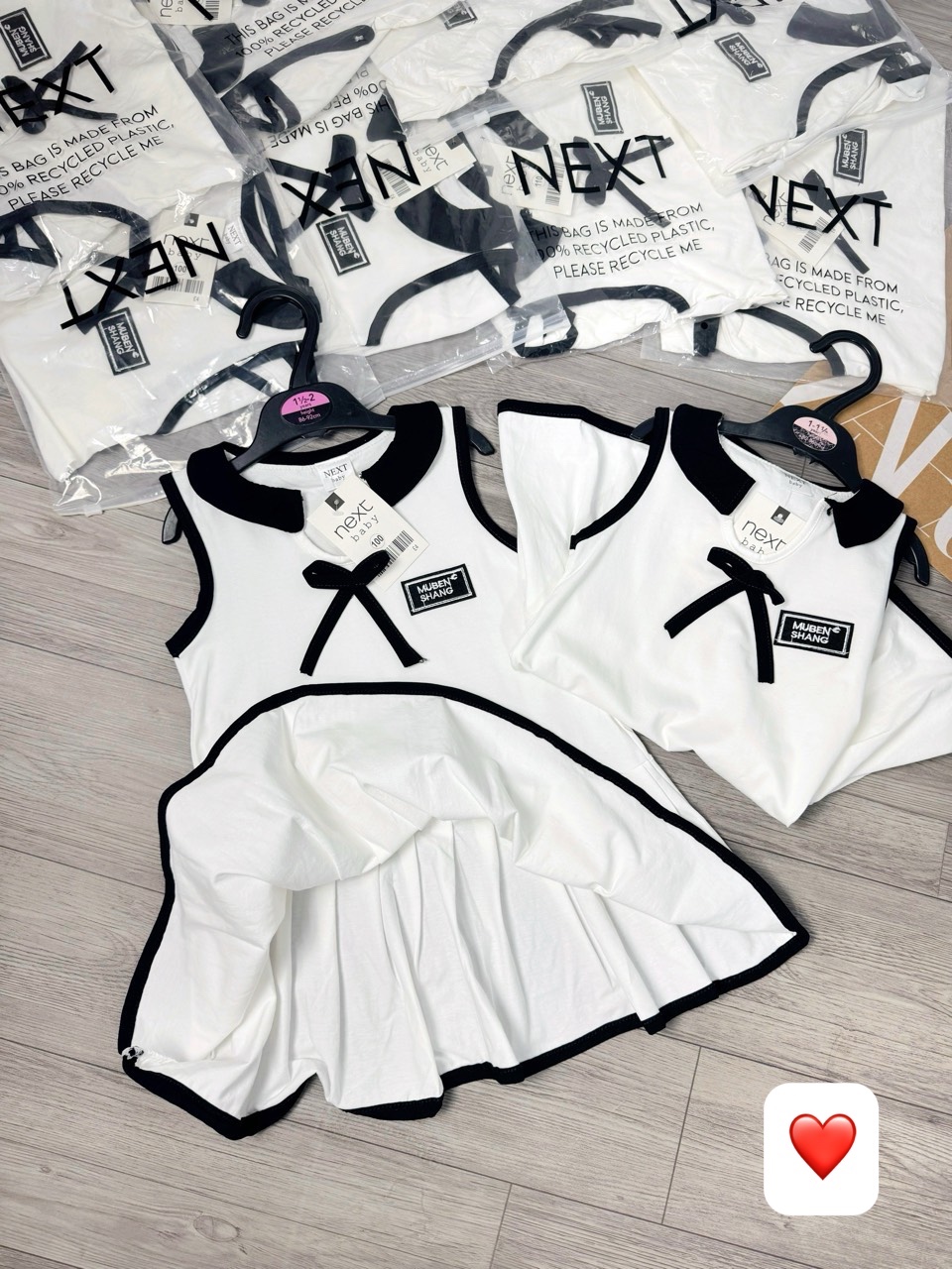 VÁY POLO ĐÍNH NƠ CỔ