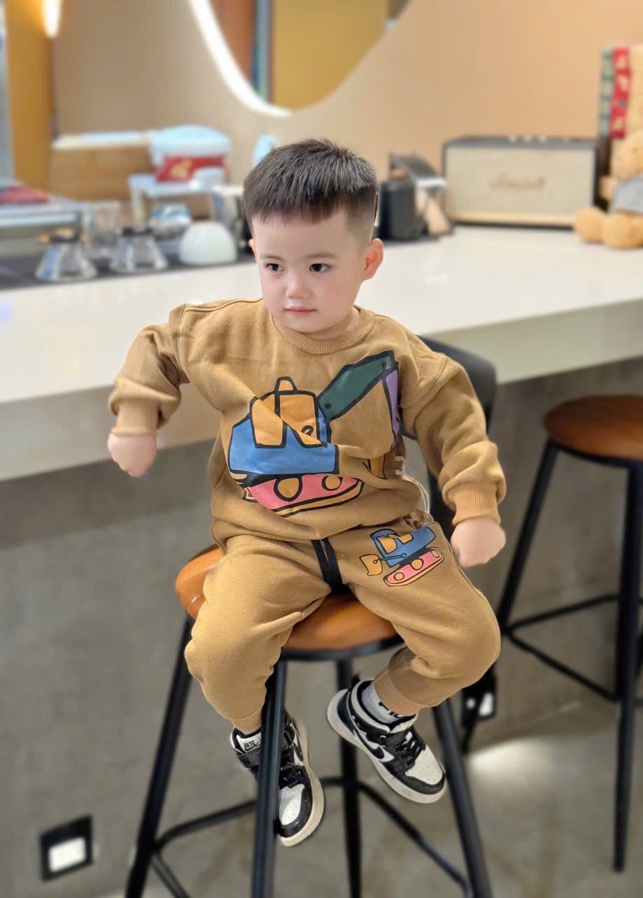 bộ nỉ máy xúc nâu