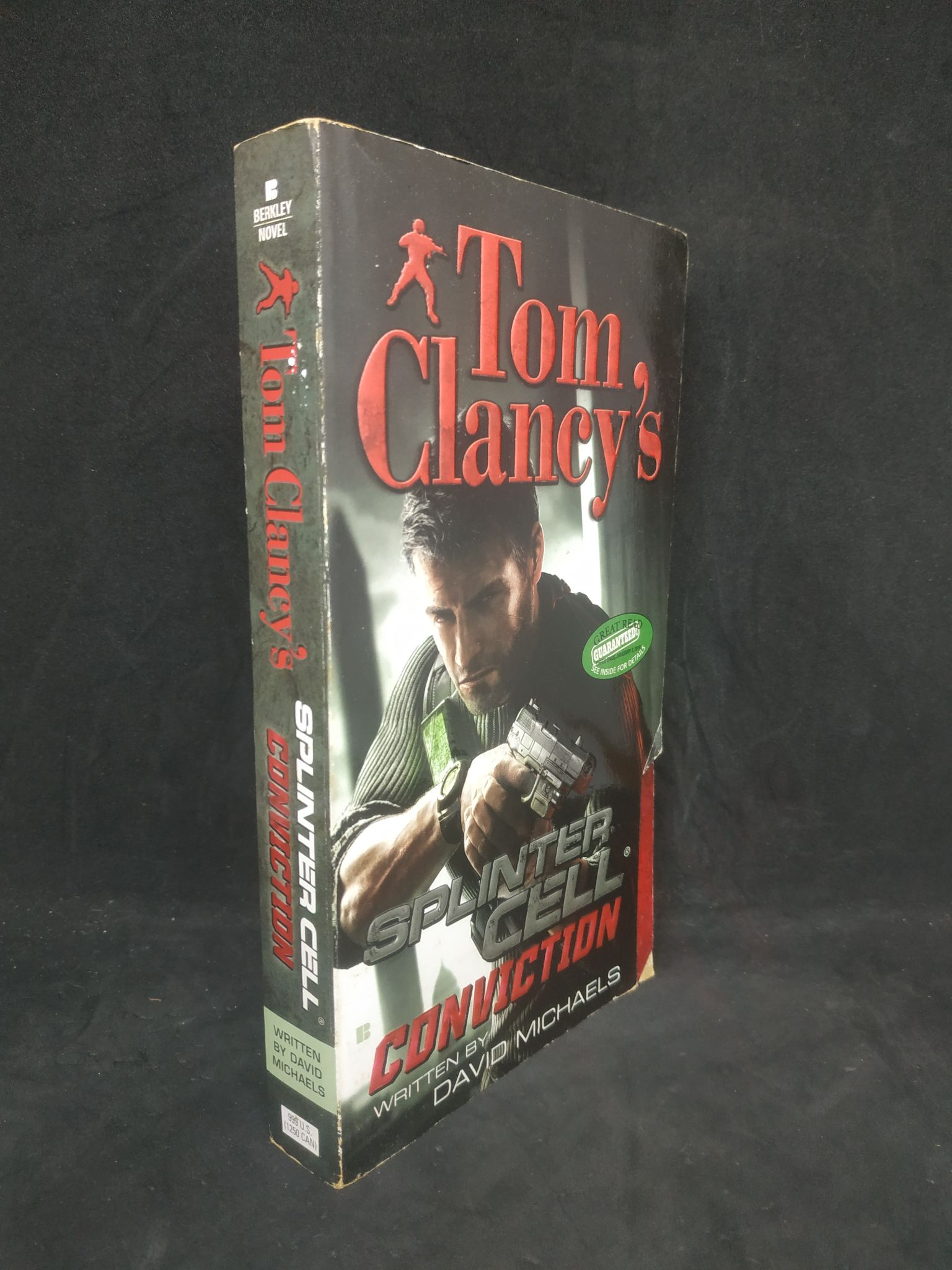 Splinter cell conviction mới 70% ( rách bìa 1 chút ) 1402 Sách ngoại văn (SL có thể đặt: 1 Cuốn) - SÁCH ĐẠI HỌC