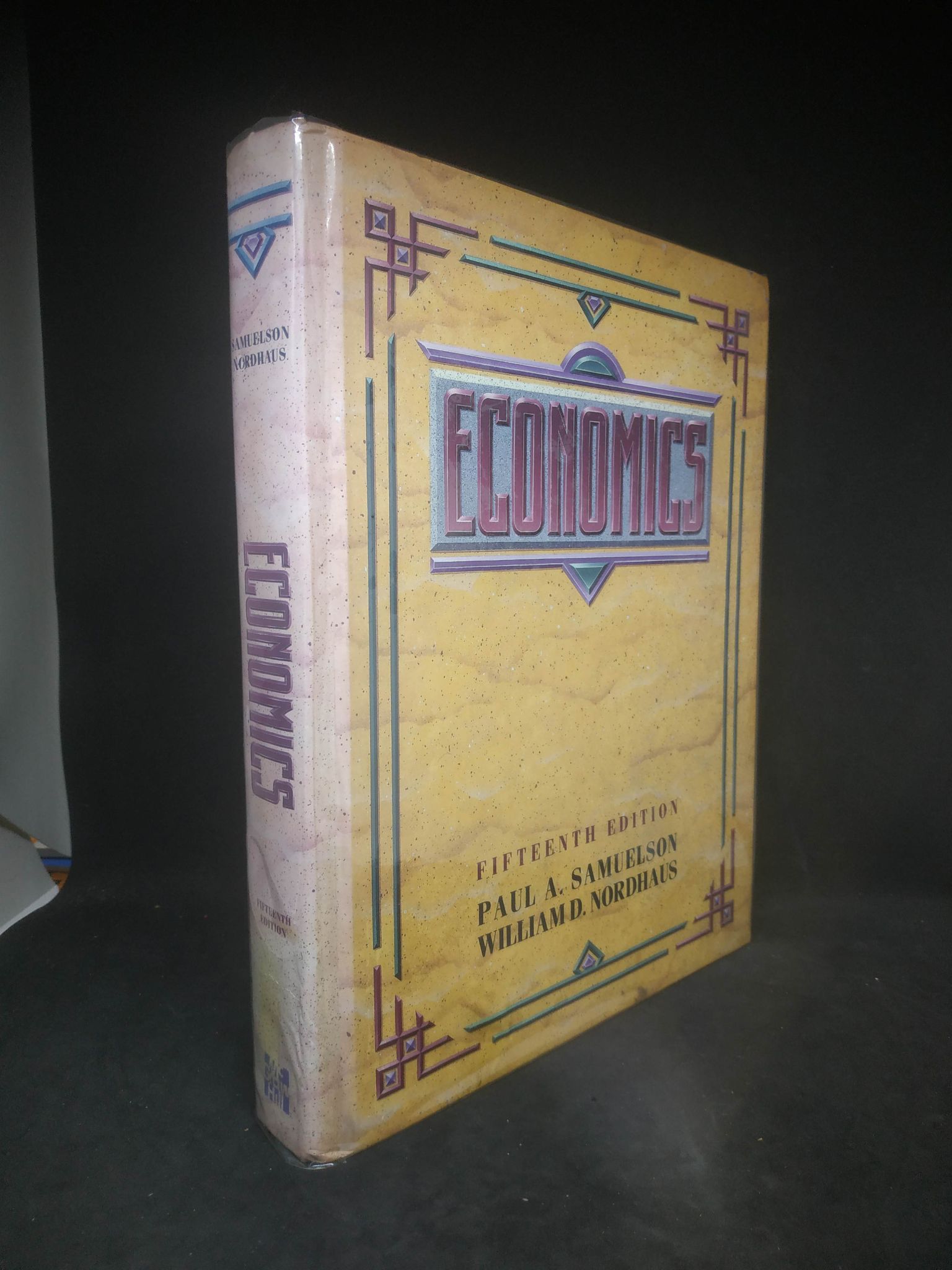 Economics (bìa cứng + sách bị ẩm nhăn trang sách ) mới 80% 1203 Sách ngoại văn (SL có thể đặt: 1 Cuốn) - SÁCH ĐẠI HỌC