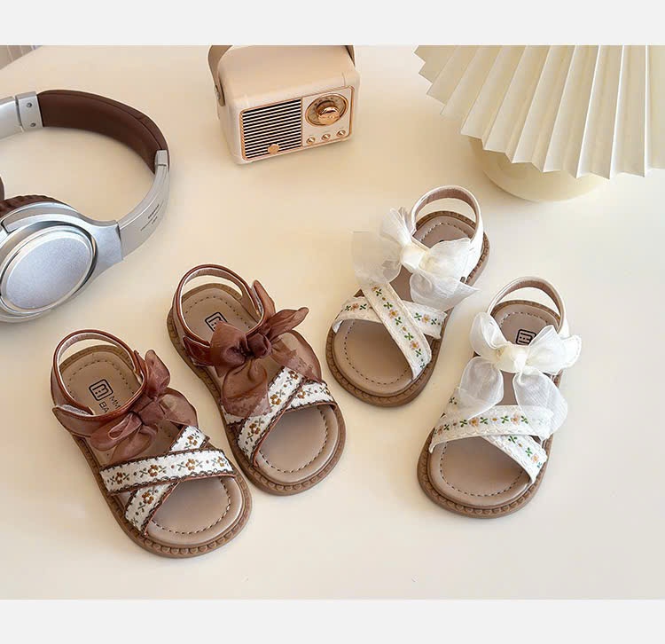 Sandal Quai Chéo Hoa Nhí Gắn Nơ