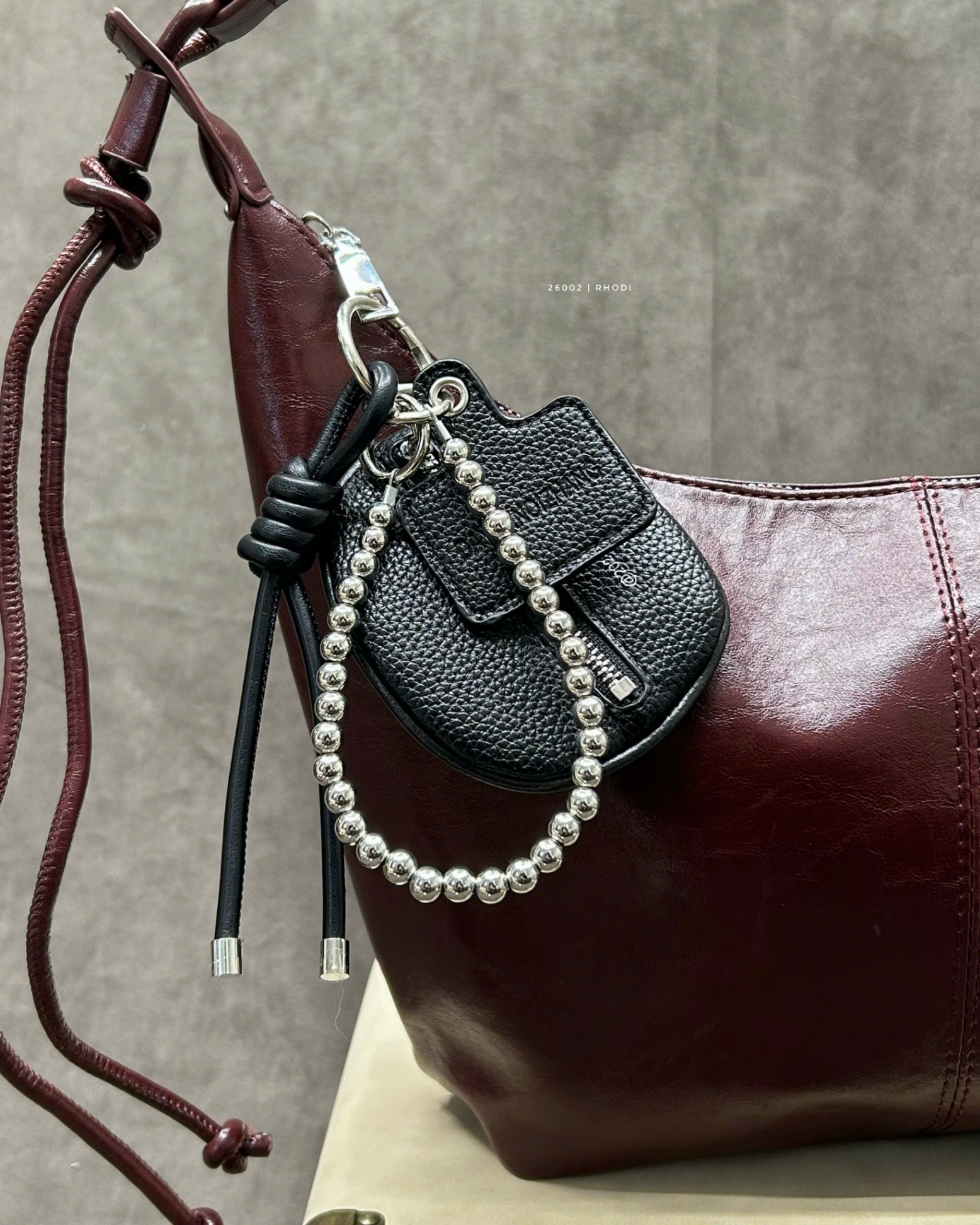 Móc keybag 26002 - túi tròn đen