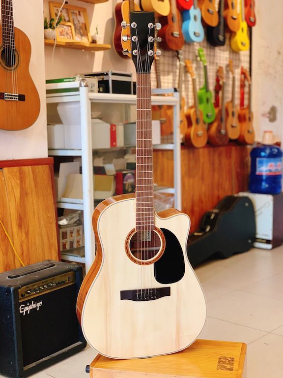 4 vấn đề khi mua đàn guitar acoustic giá rẻ bạn nhất định phải biết 4