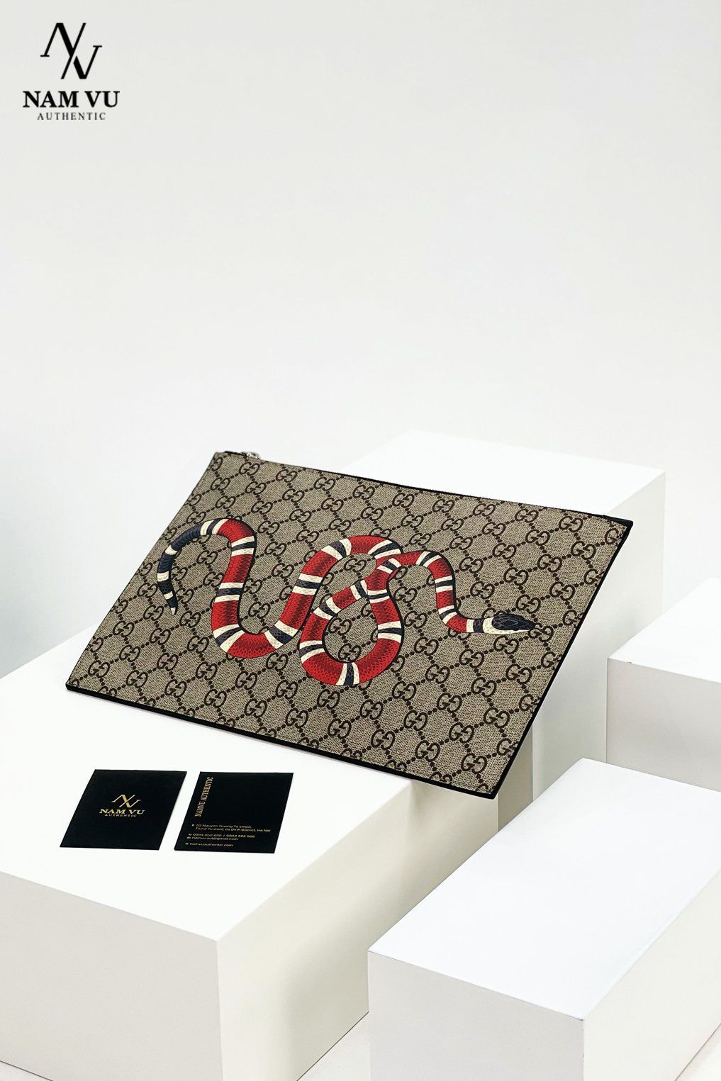 PKGC clutch Snake vân monogram