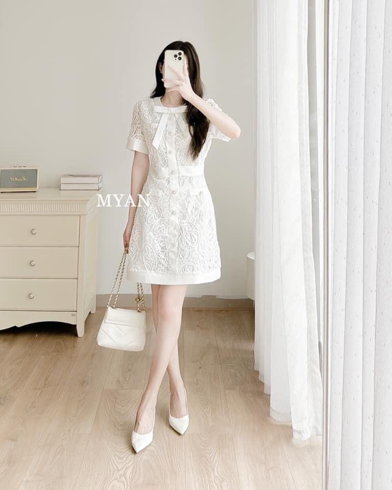 Váy ren vân nổi hàng cúc dọc phối nơ
