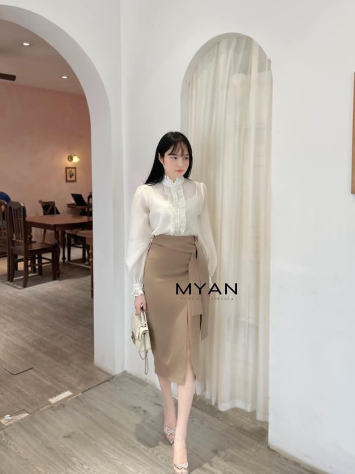 Chân váy xẻ trước buộc nơ lệch