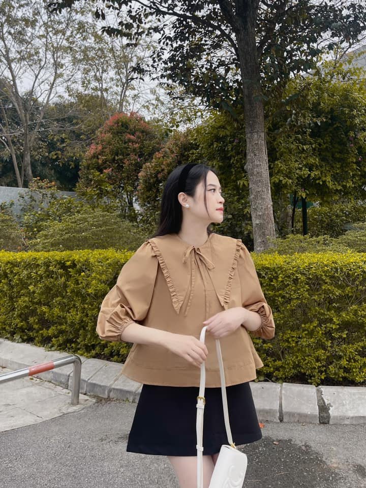 Áo sơ mi cổ nhọn kẹp tay bồng