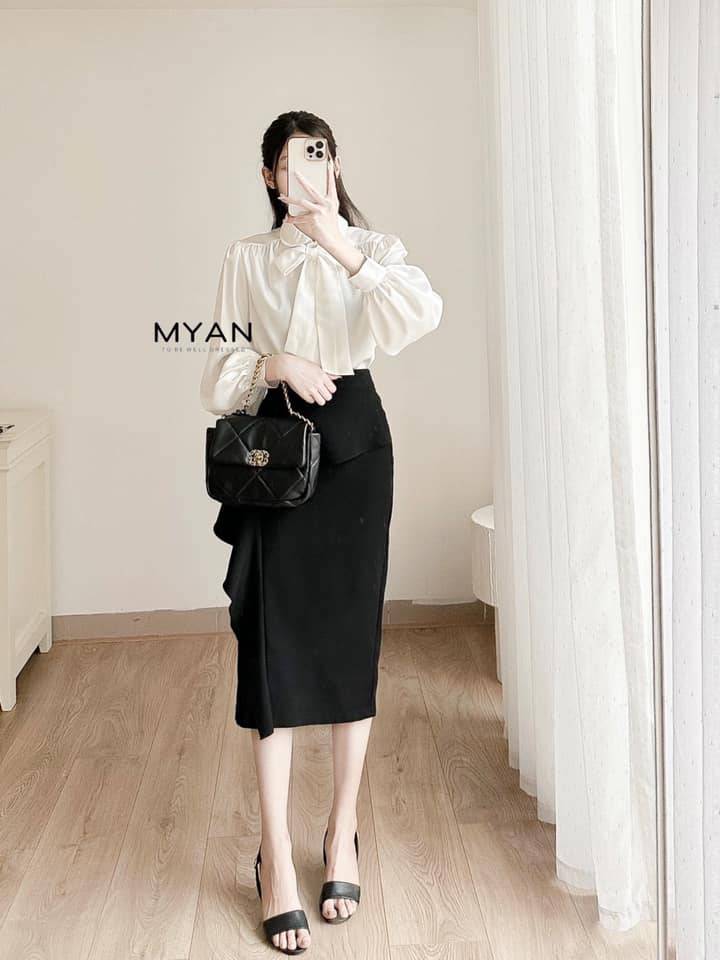 Chân váy bút chì bèo đổ xẻ sau