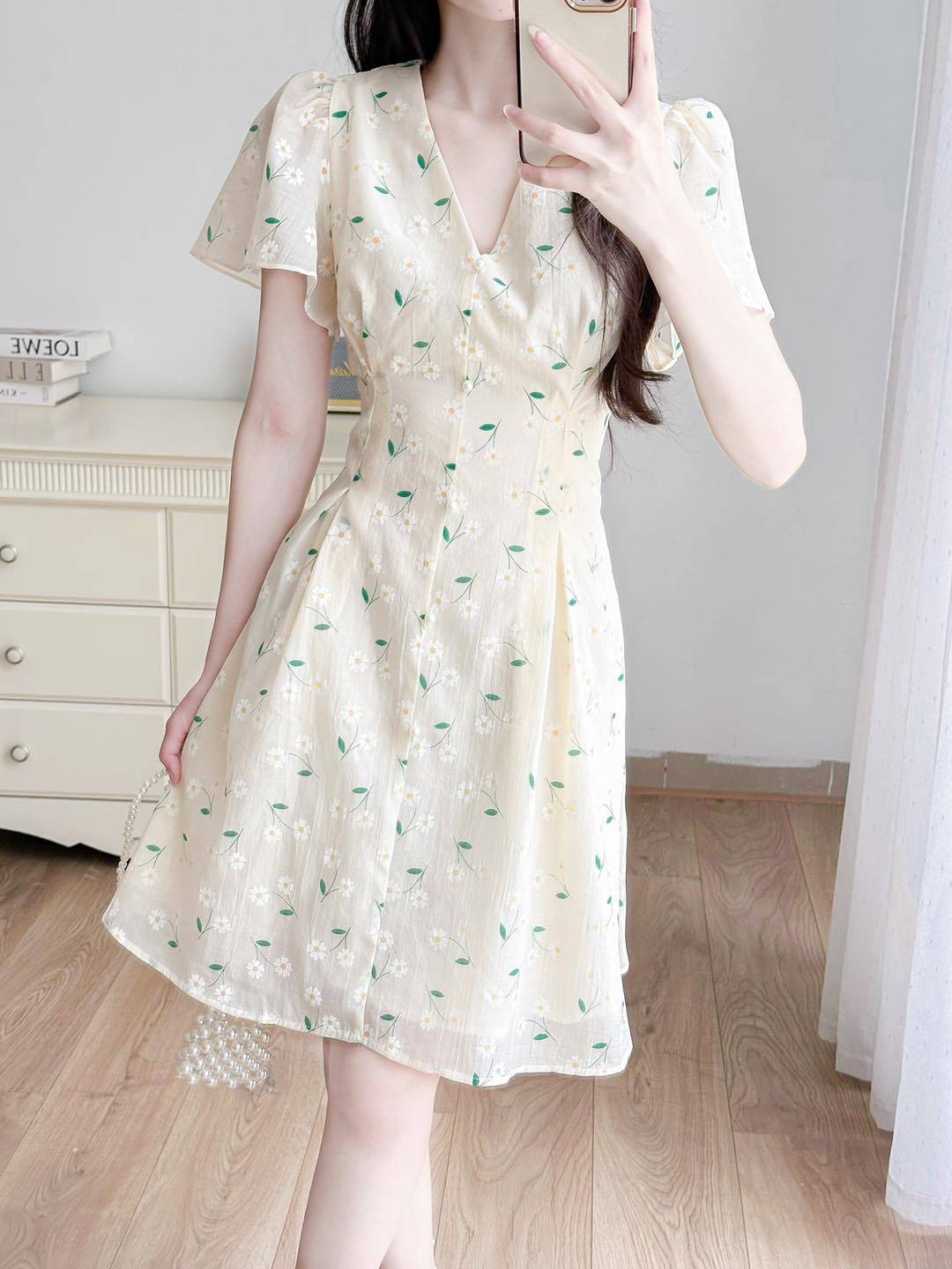 Váy hoa cổ tim cúc ngọc tay cánh tiên