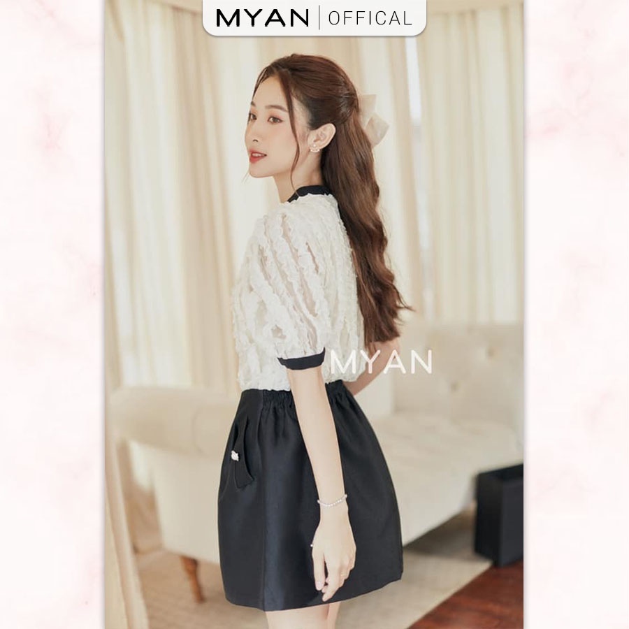 Chân váy xòe cúc ngọc cạp chun sau