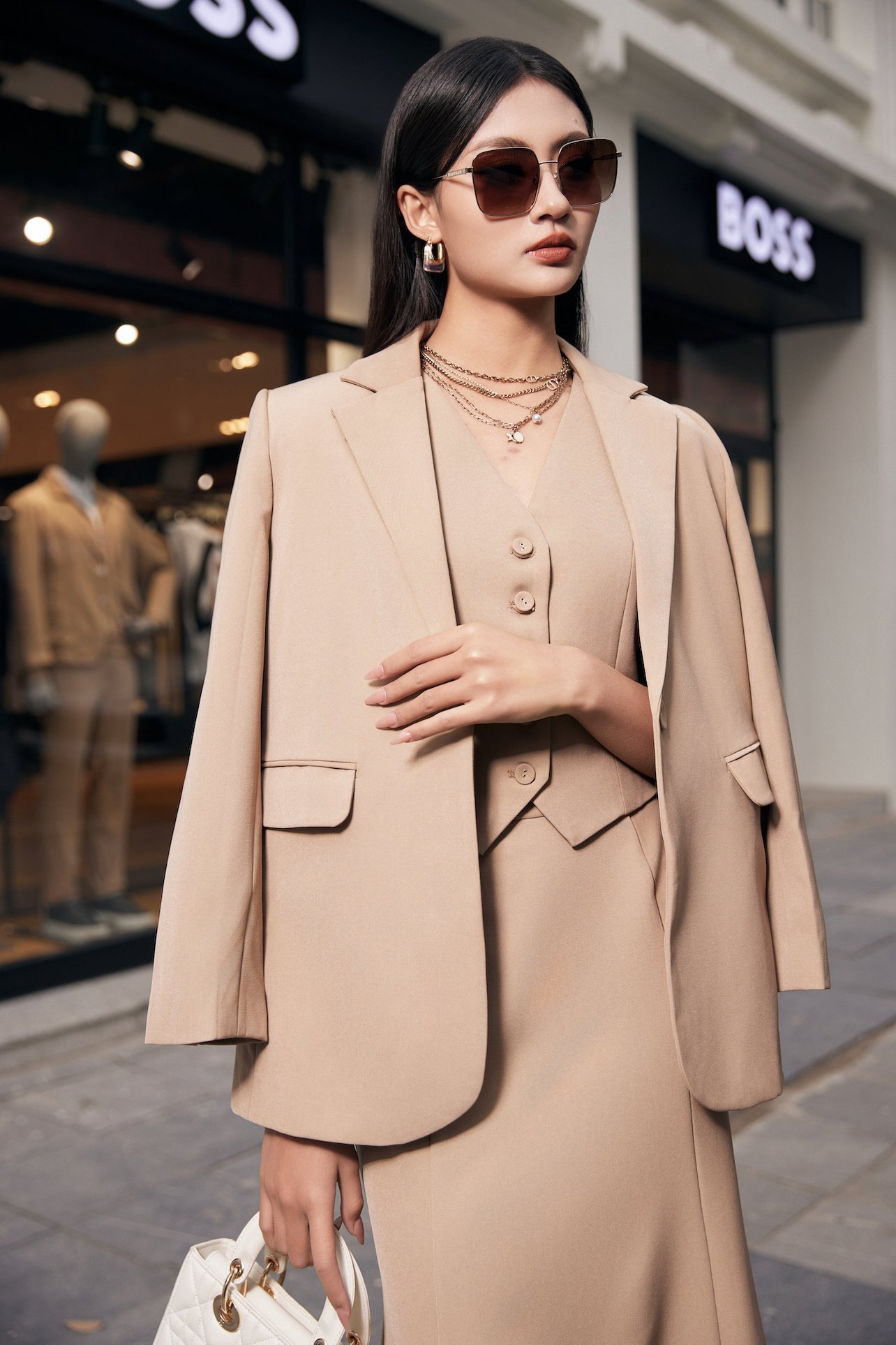 Áo khoác vest 2 túi cúc bọc mắt cáo