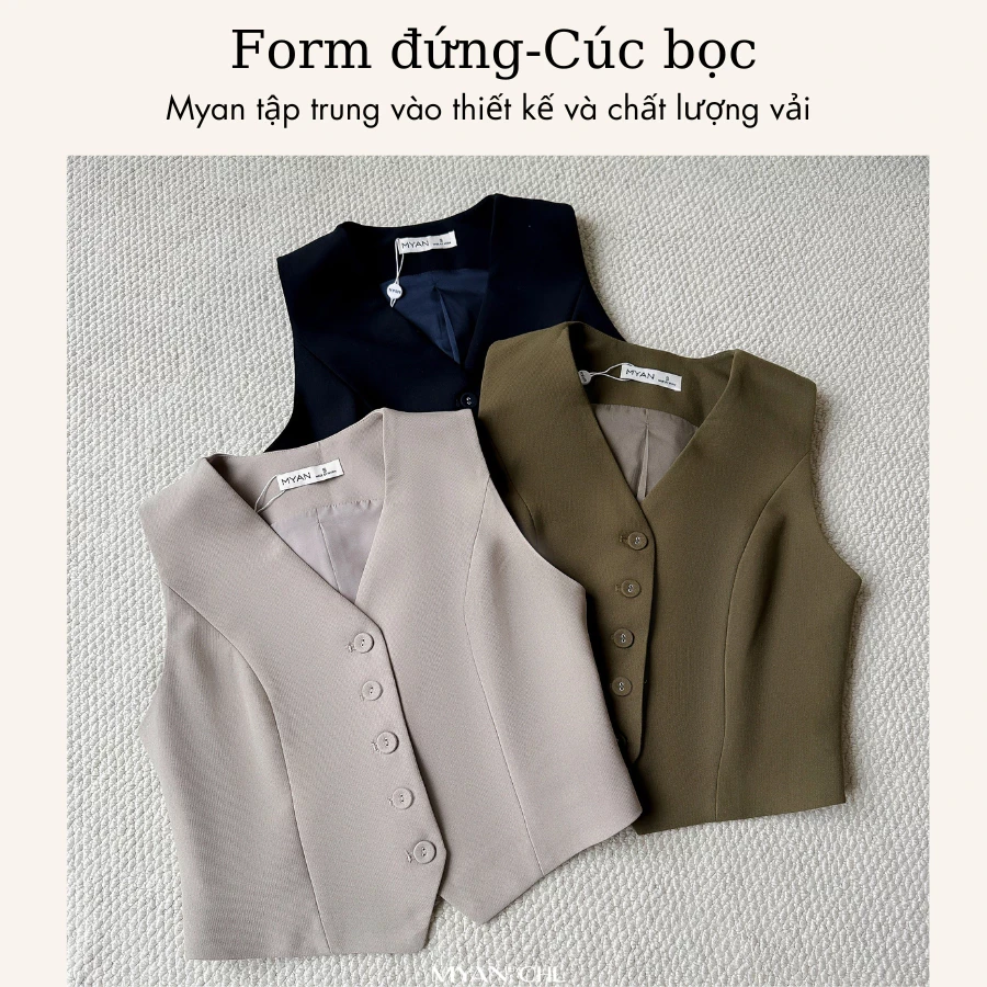Áo gile cổ V cúc bọc mắt cáo
