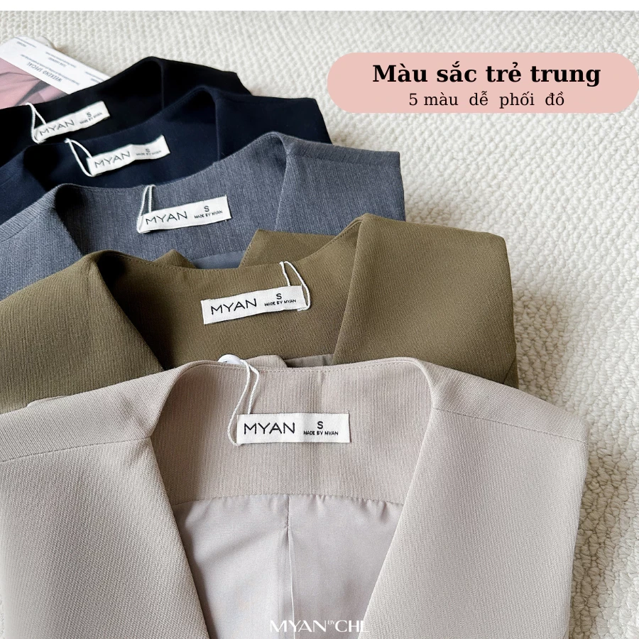 Áo gile cổ V cúc bọc mắt cáo