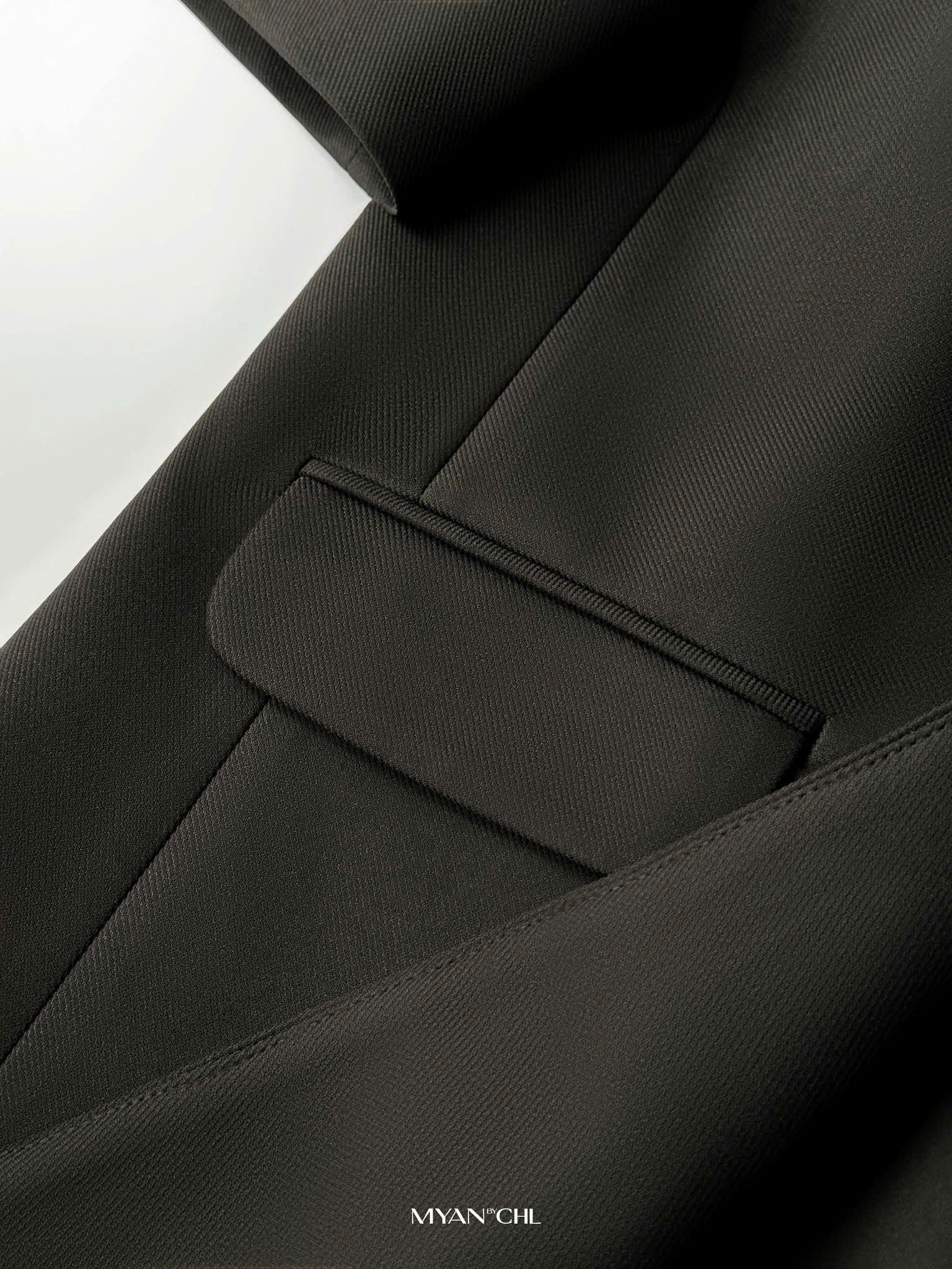 Áo Blazer không cổ vạt tròn