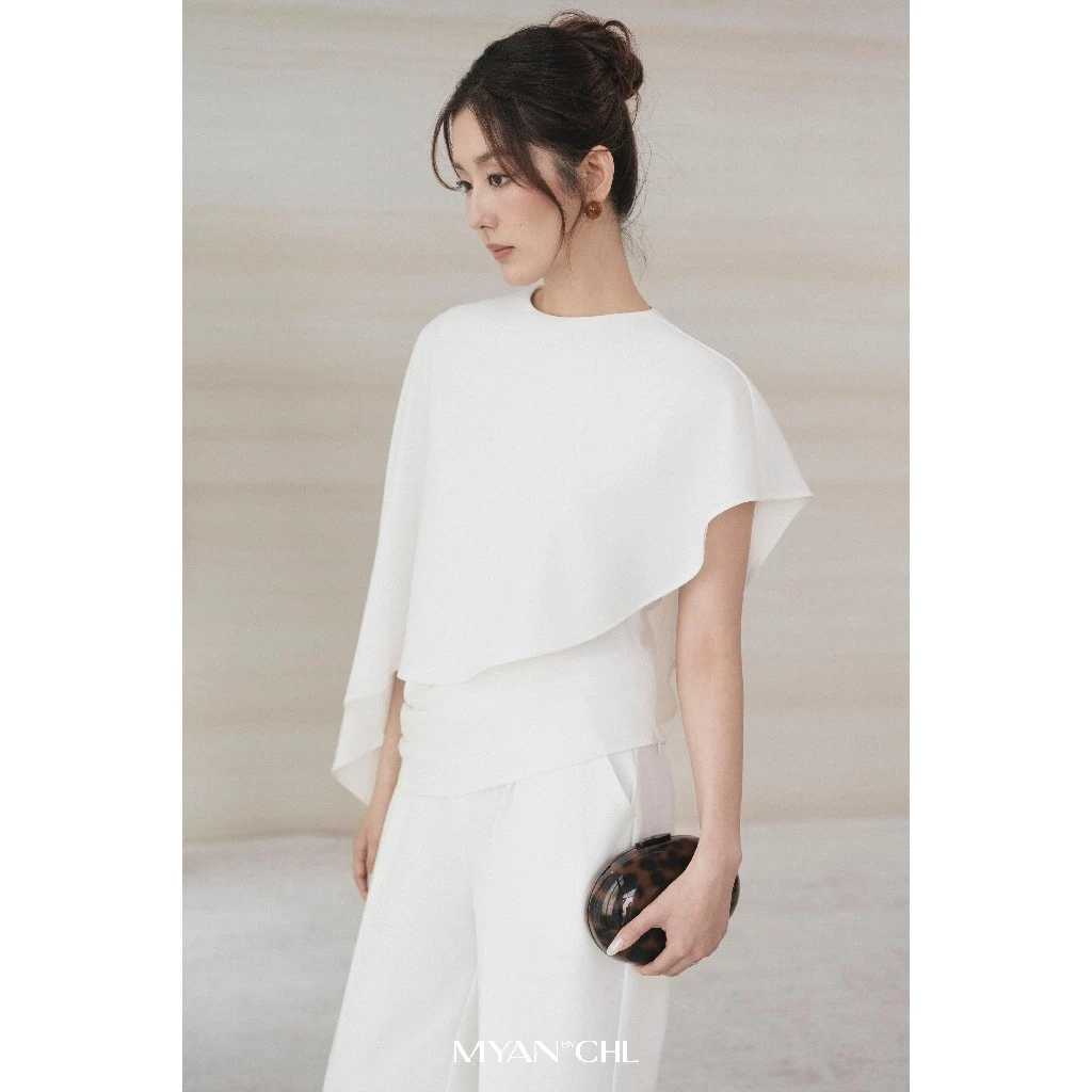 Áo phủ vạt lệch thân xếp ly