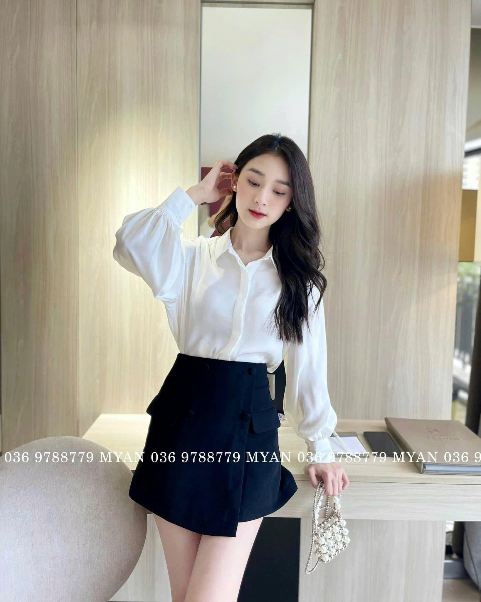 Chân váy vạt chéo 4 cúc nắp túi (2m)