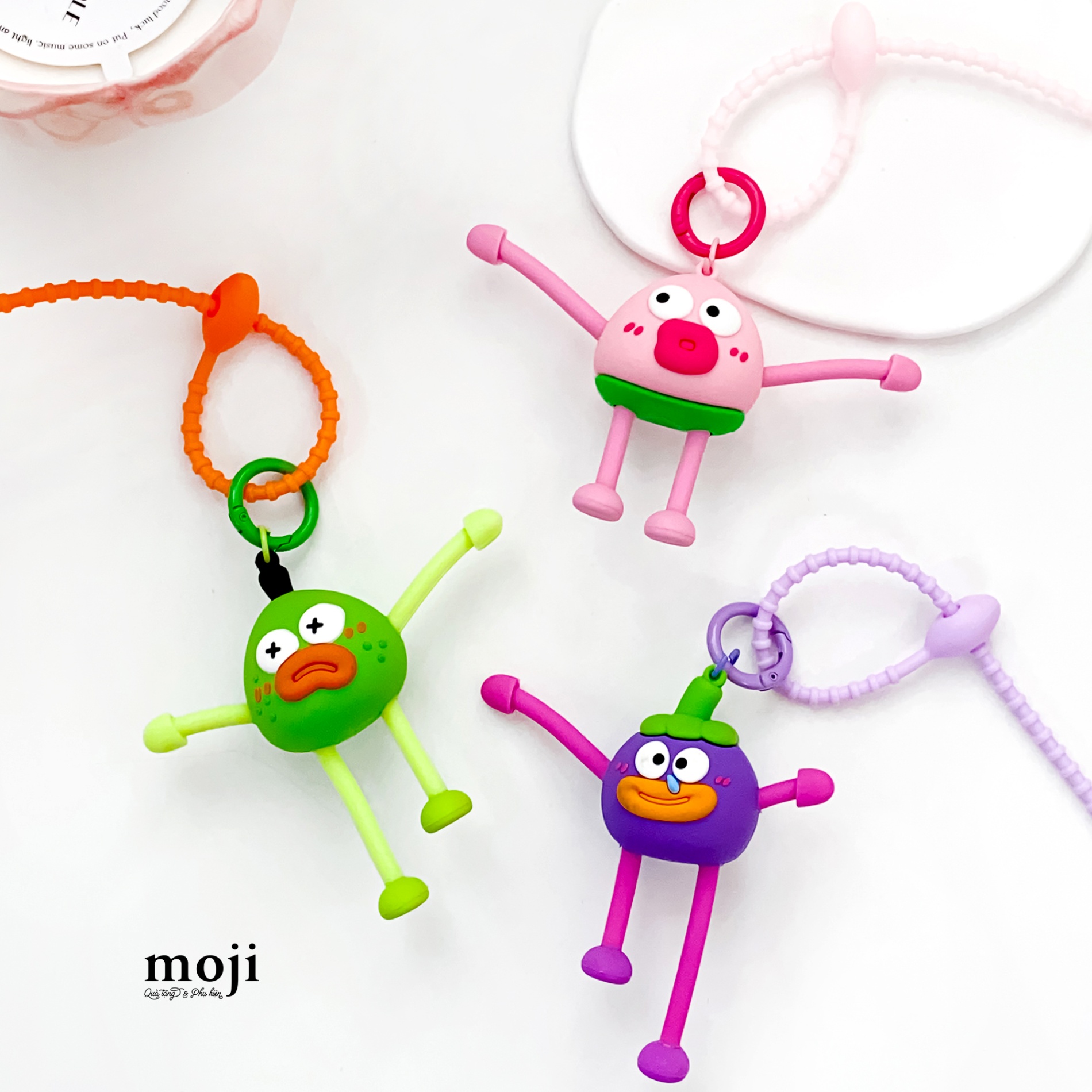 Móc khóa MJ Funny vibes fruit emotion face môi dày tay rút