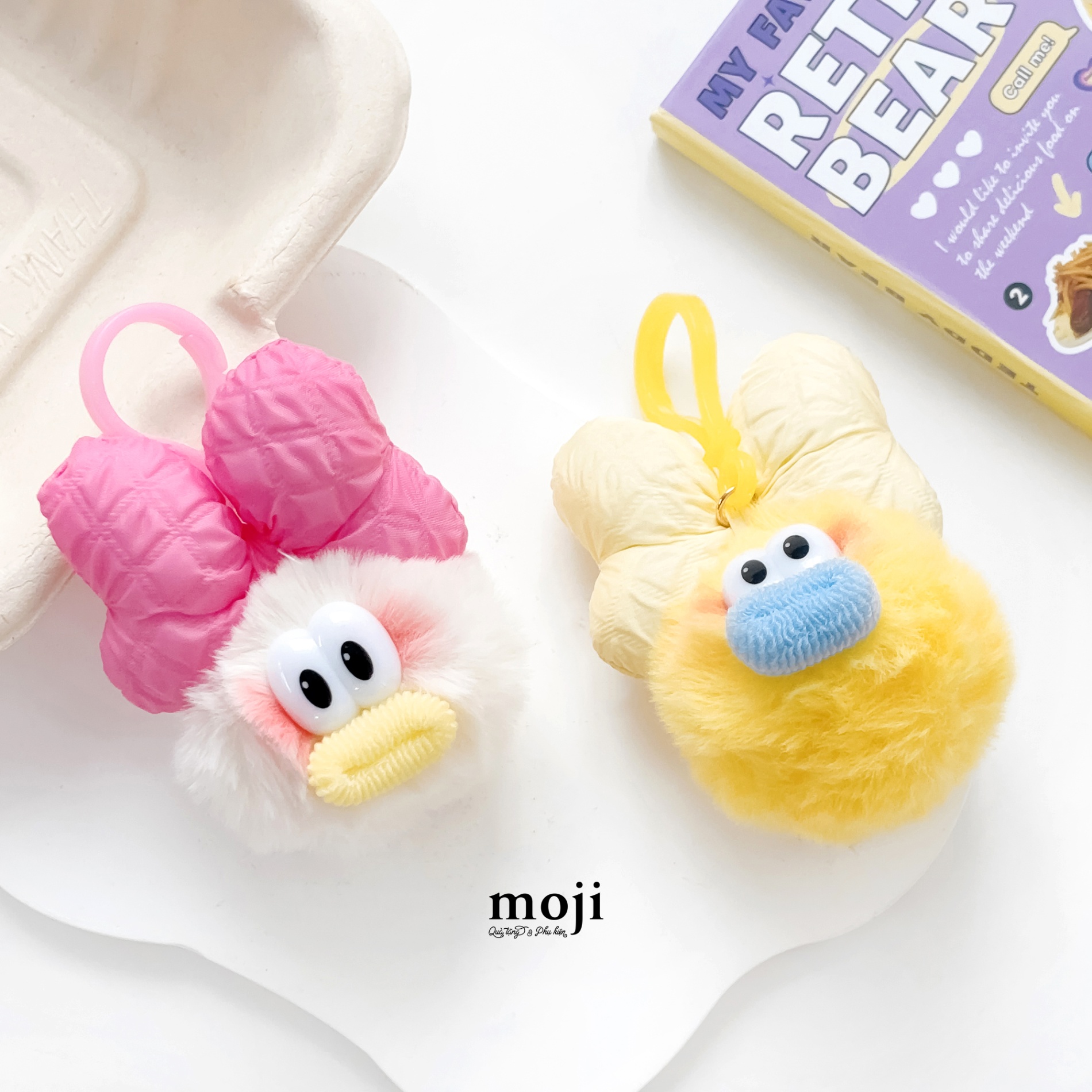 Móc khóa cục bông Funny vibes face big eyes môi dày nơ màu