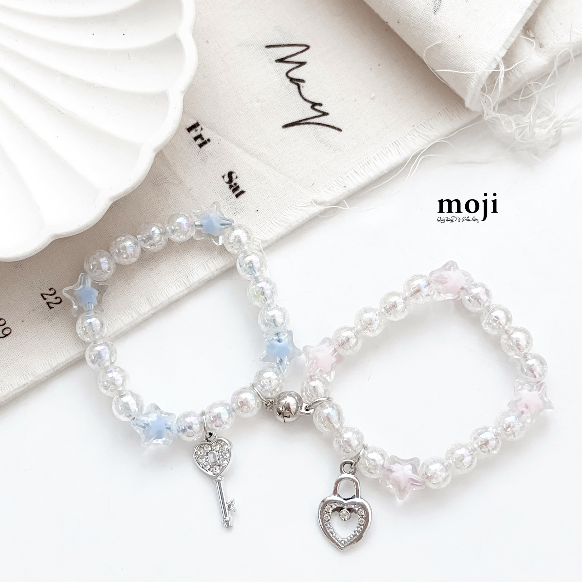 Vòng tay set2 Couple lock and key star hạt tròn nam châm