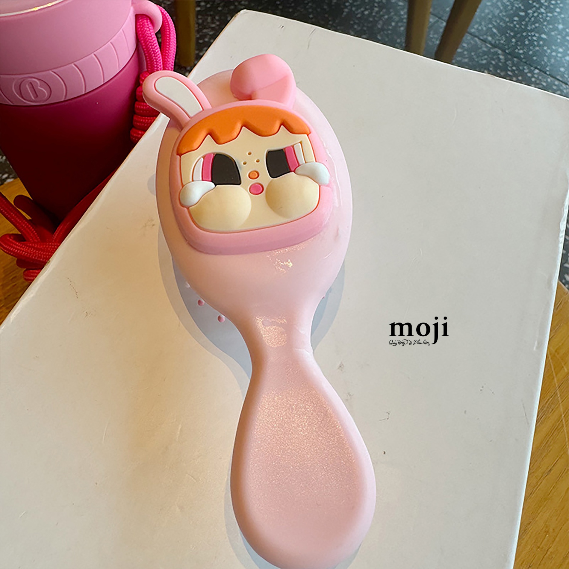 Lược đệm mát xa unoff Crybaby big face nền màu