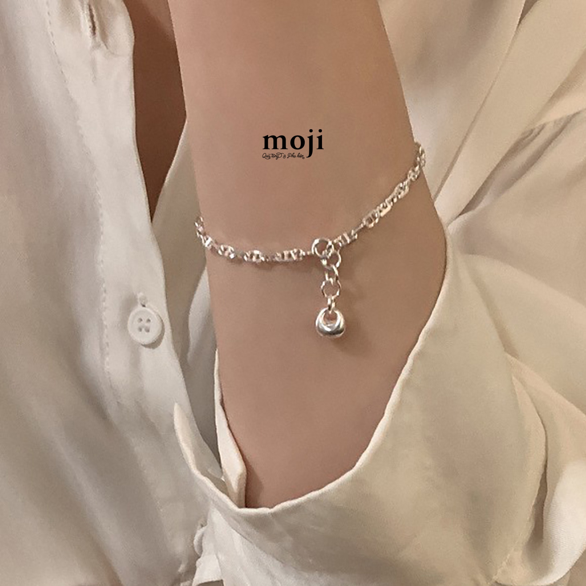 Vòng tay mạ bạc dây thả hạt dáng túi xách nhỏ