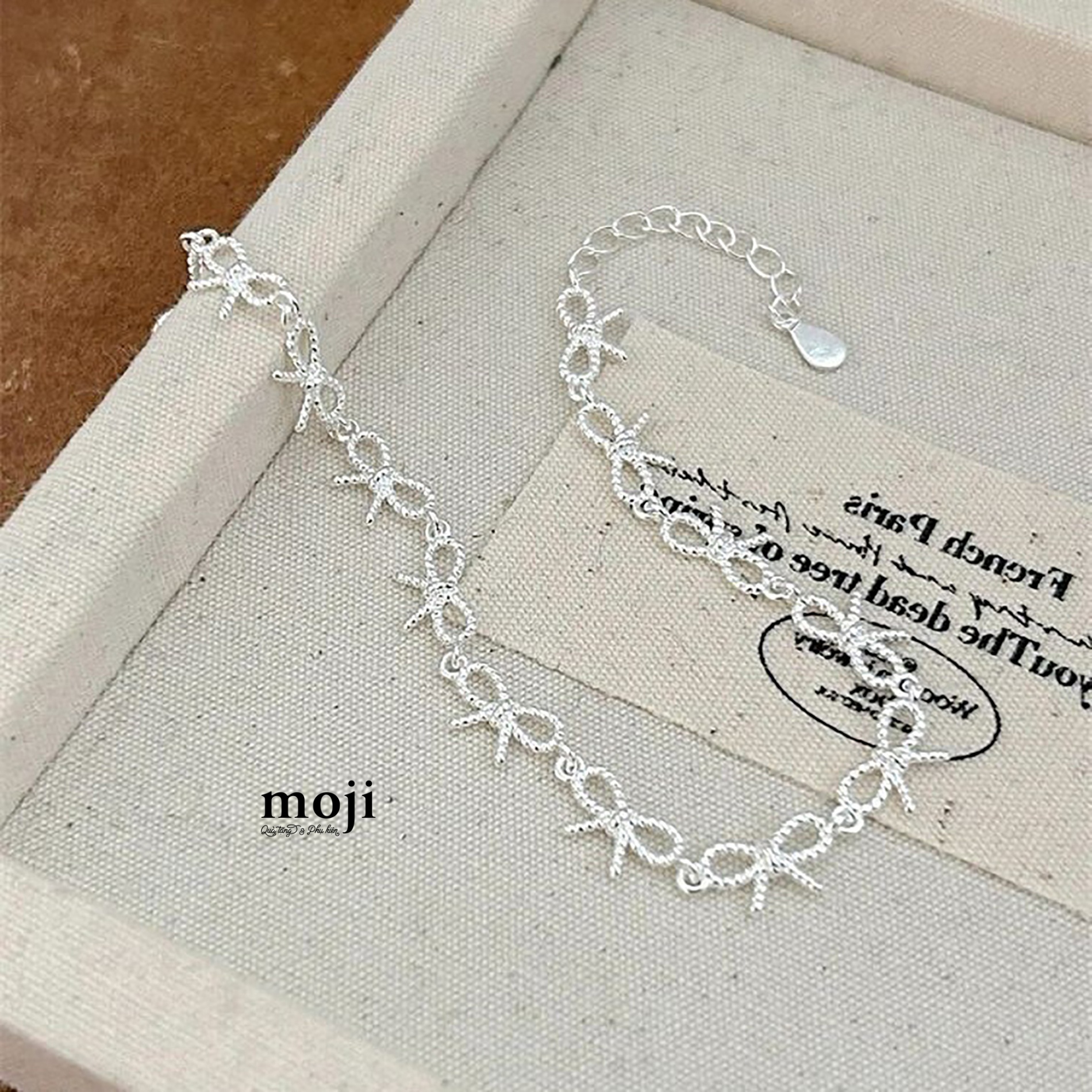Vòng tay mạ bạc chuỗi bow nơ