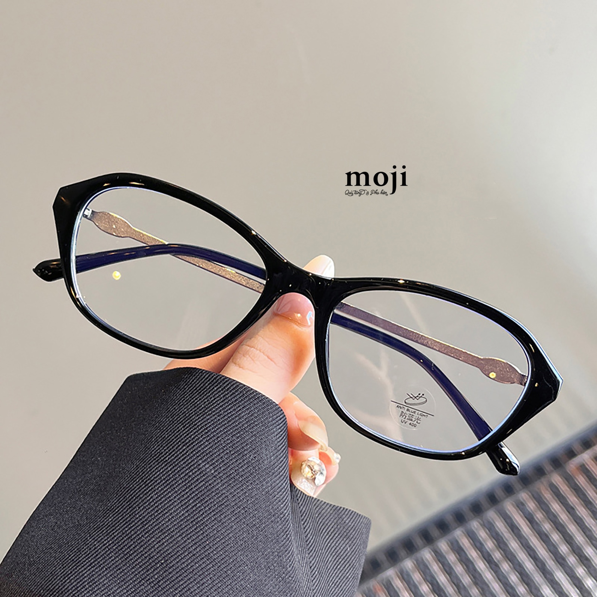 Kính gọng kim loại mắt nhựa phối oval nhỏ chân bọc nhựa
