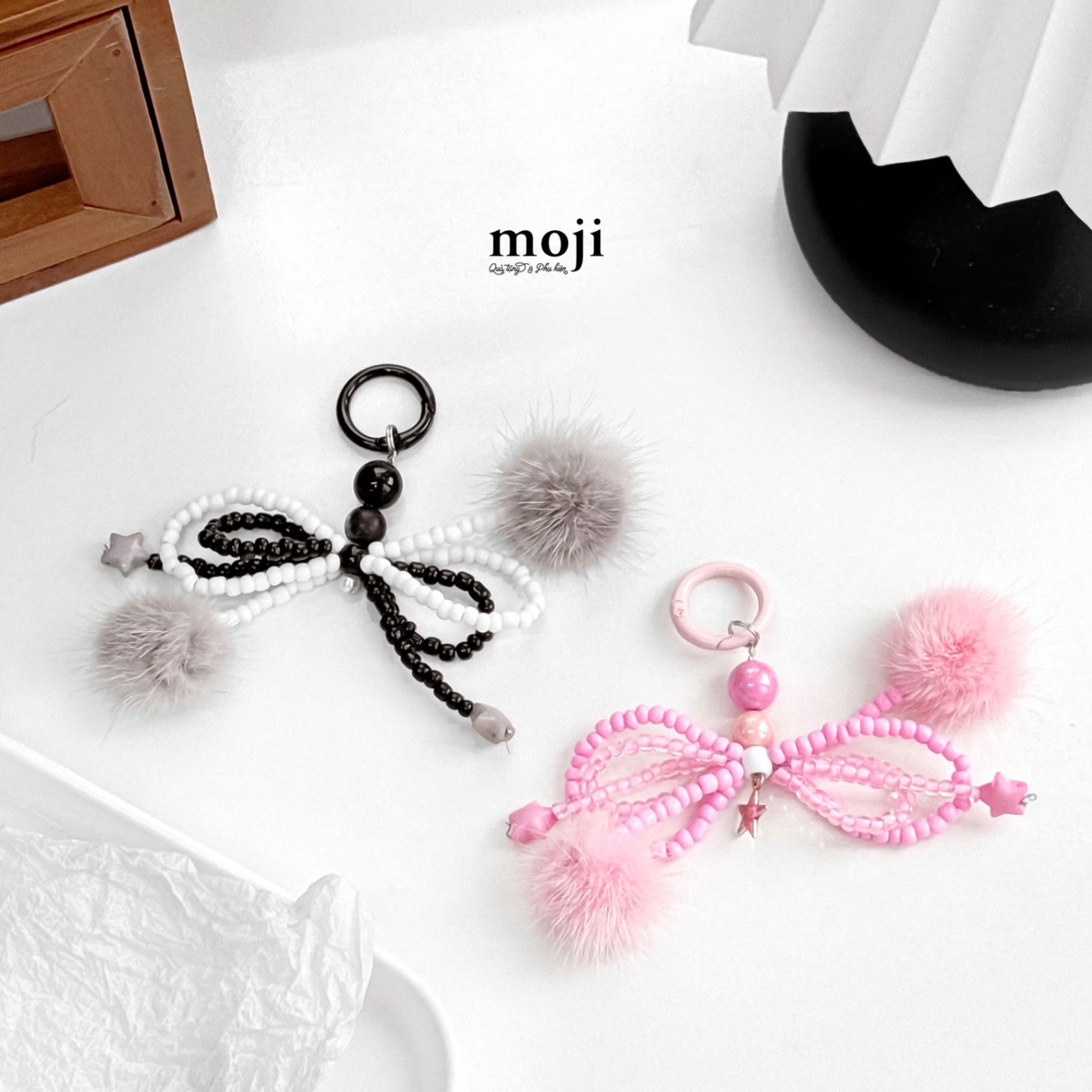 Móc khóa mini cục bông hạt kết double bow nơ phối màu