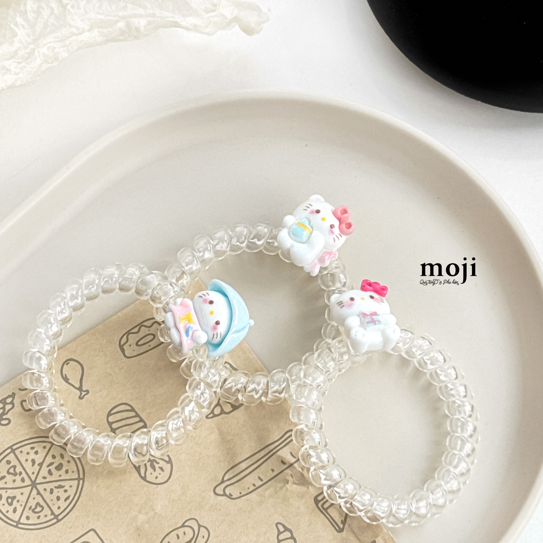 Buộc tóc lò xo trong suốt Sanrio family Hello Kitty happy time