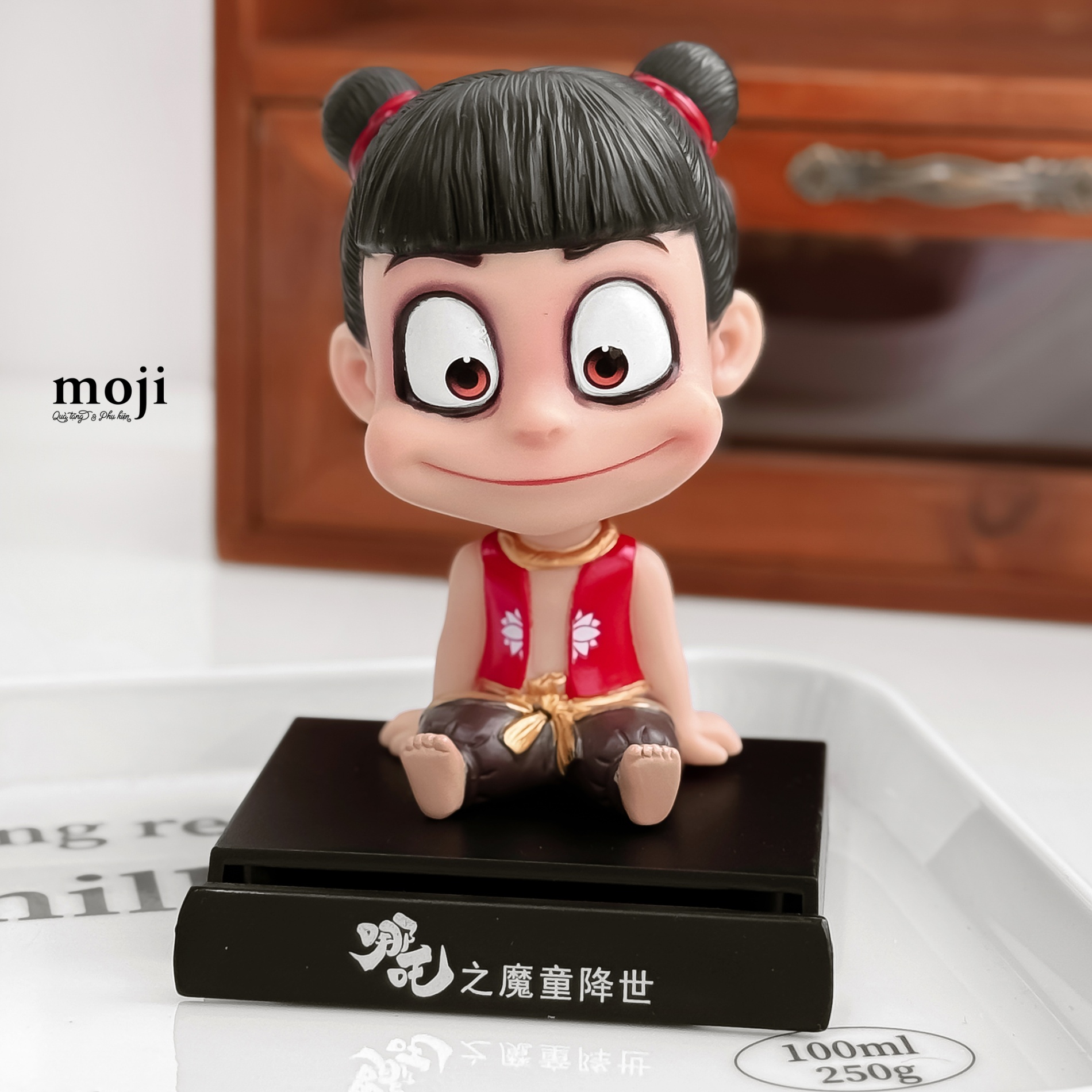 Tượng trưng bày giá đỡ điện thoại Na Tra happy face