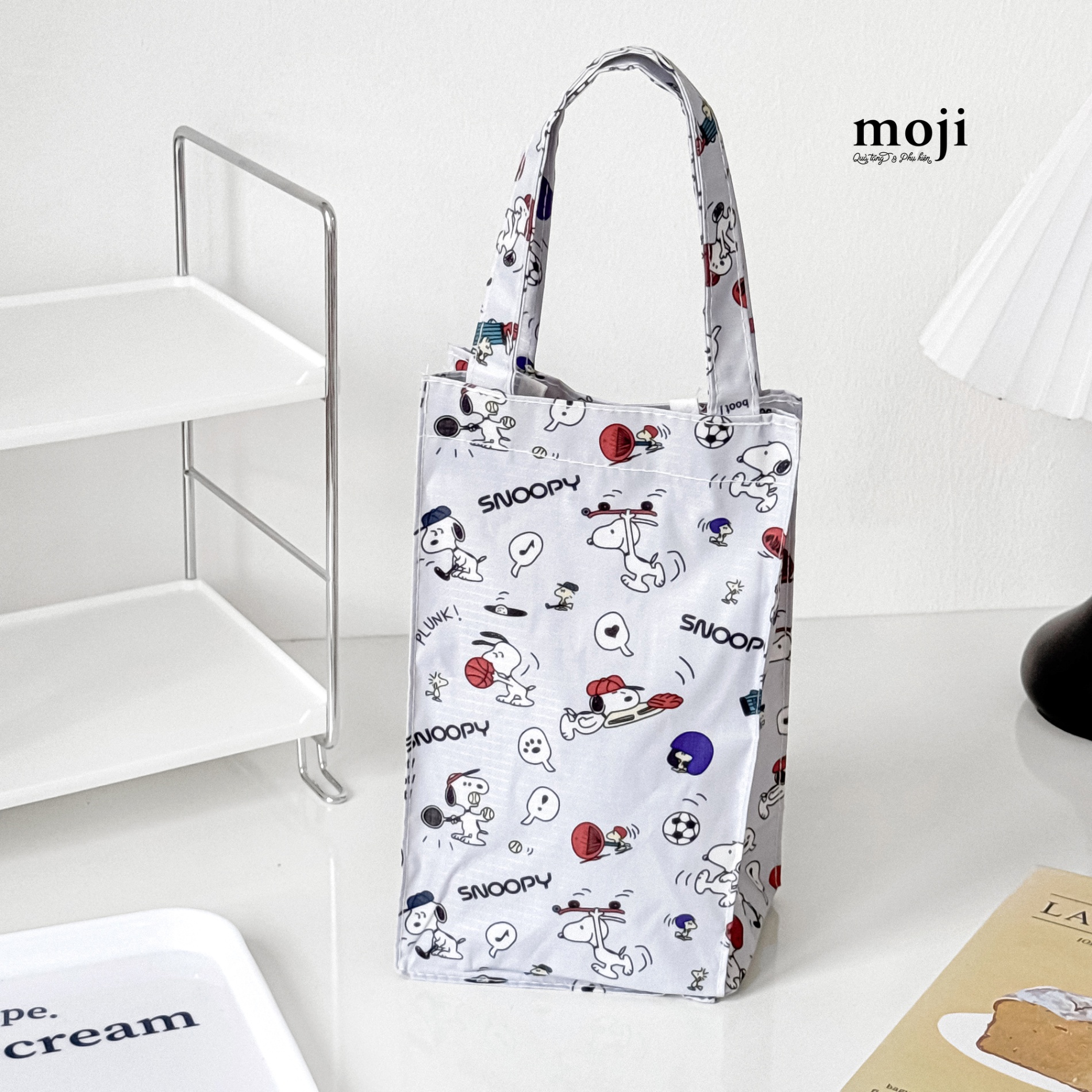 Túi đựng bình nước Snoopy chơi thể thao 9x13x26