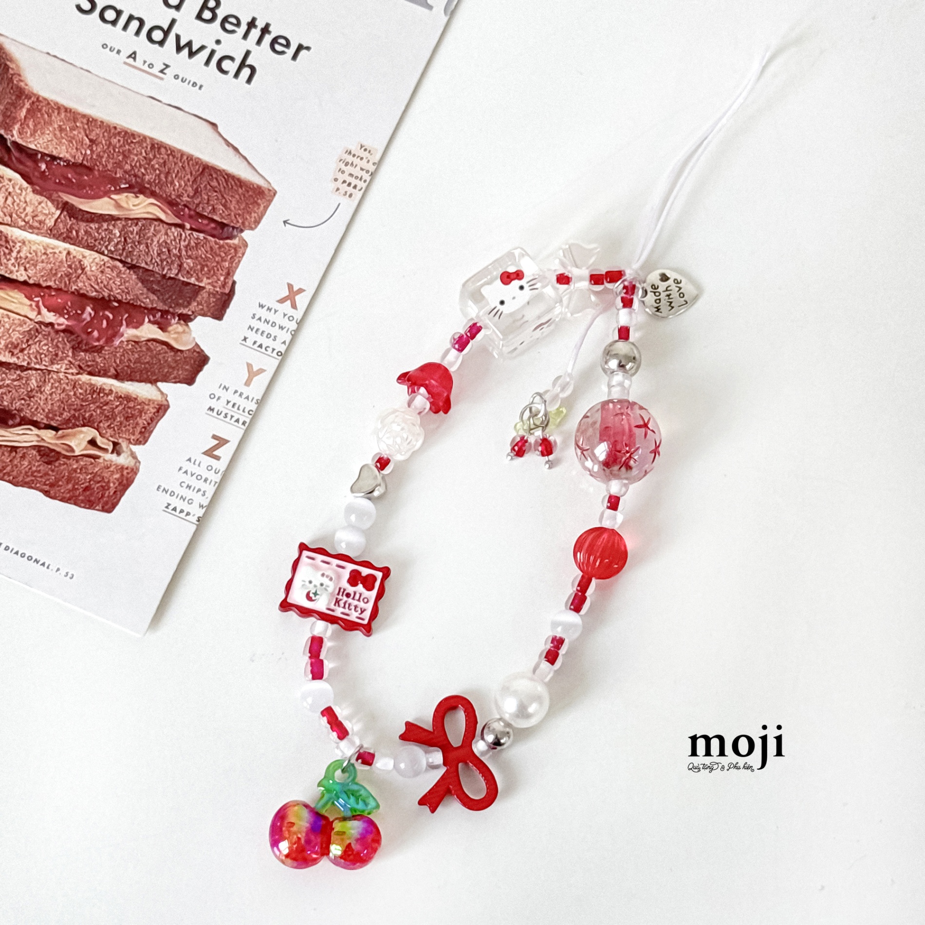 Dây đeo điện thoại Sanrio family Hello Kitty fruit cherry