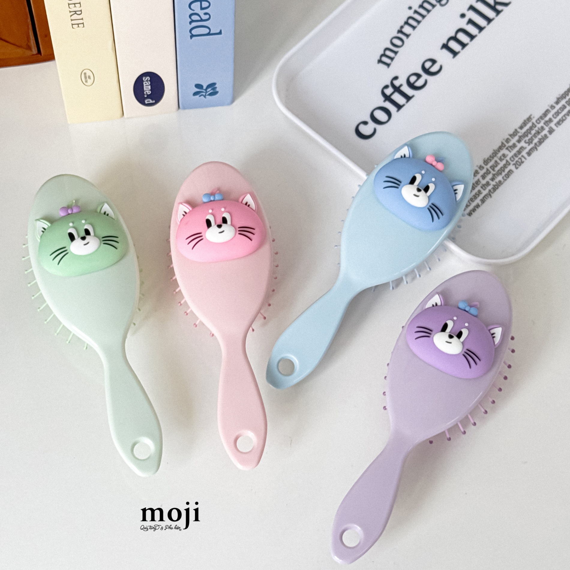 Lược đệm mát xa Colorful cat face nơ nhỏ nền màu