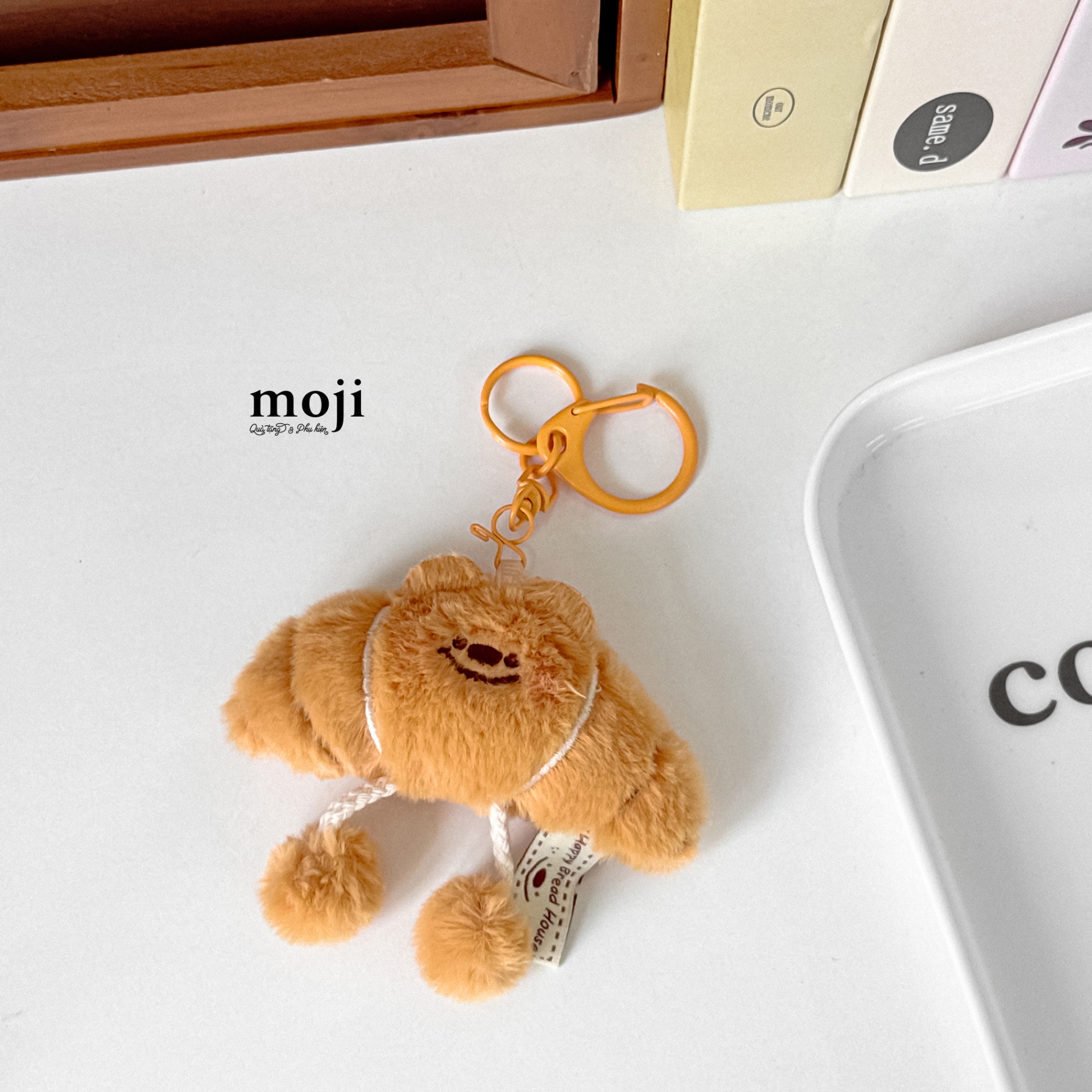 Móc khóa nhồi bông Happy croissant bánh sừng bò có chân cục bông