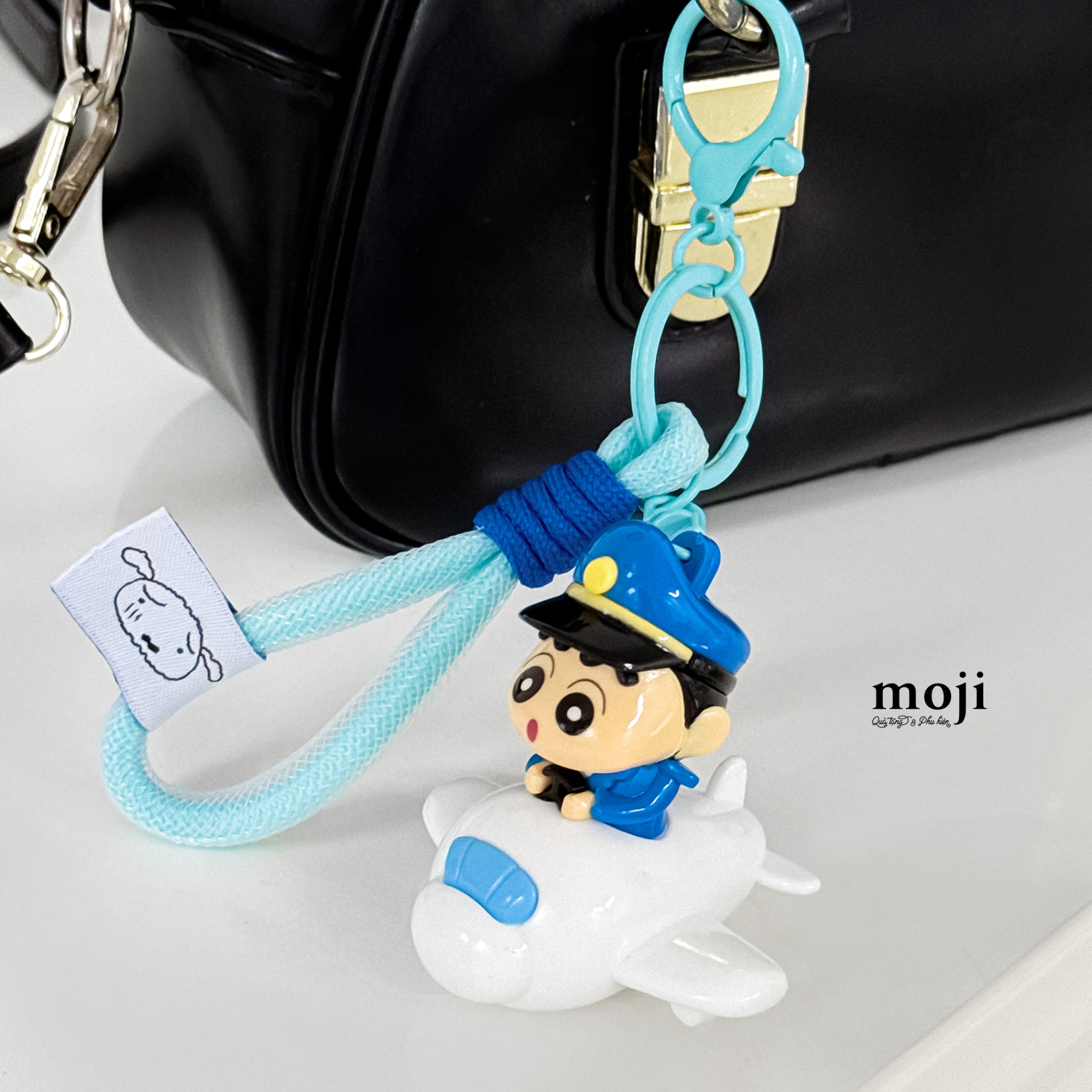 Móc khóa MJ Shinchan phi công lái máy bay