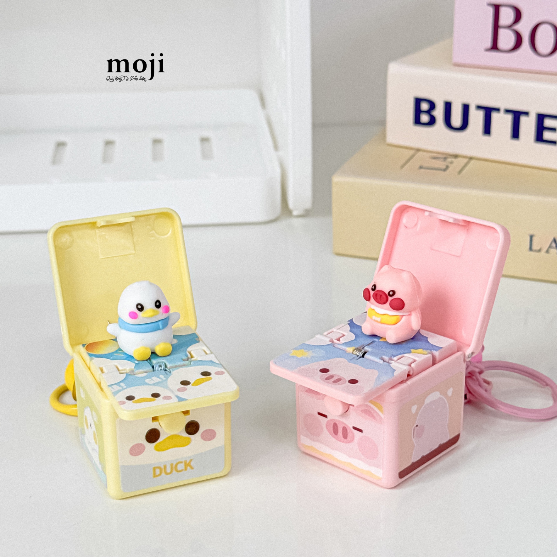 Móc khóa đồ chơi Cute duck pig bật nắp bất ngờ leng keng