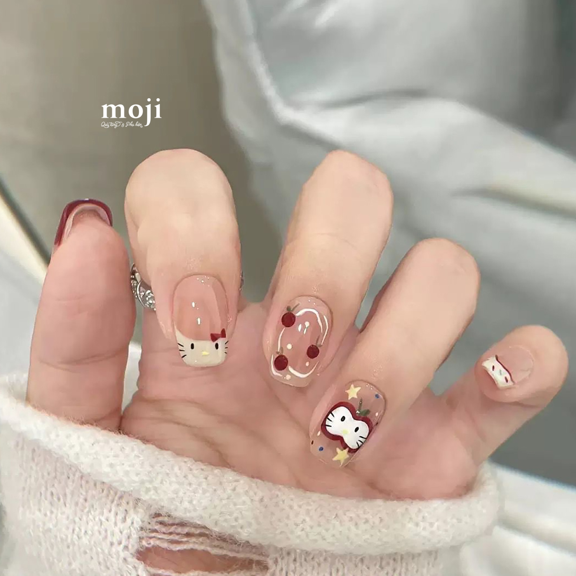 Móng tay giả Sanrio family Hello Kitty fruit apple kèm keo E52 set10