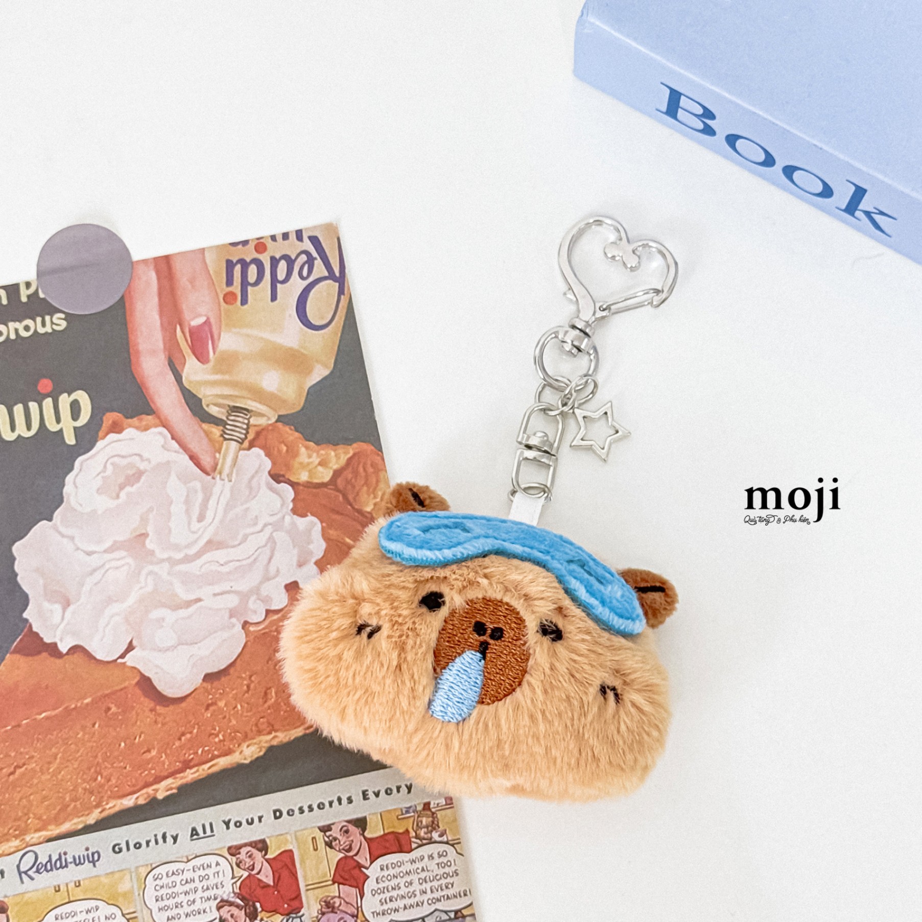 Móc khóa nhồi bông Capybara face chảy nước mũi đeo bịt mắt