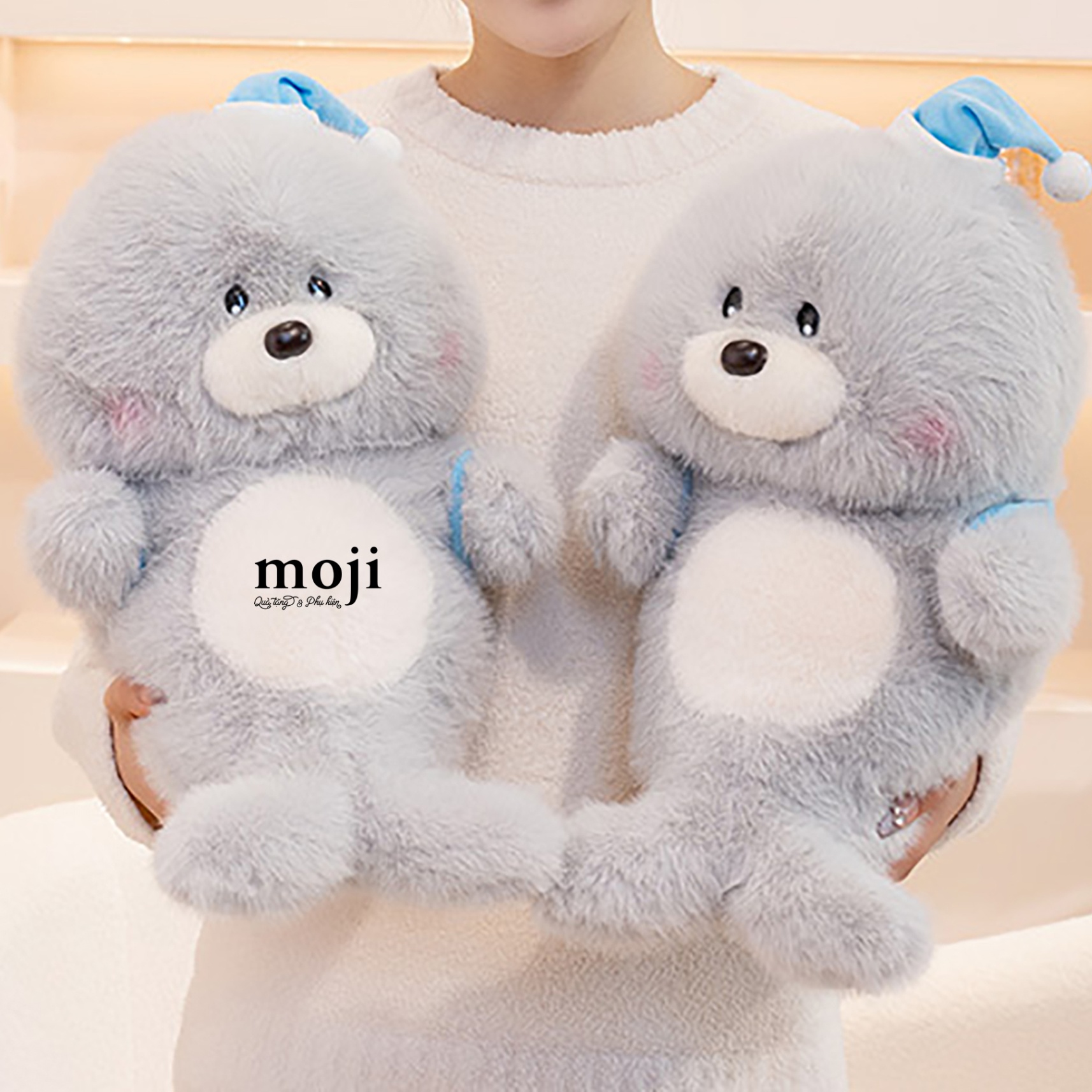 Gấu bông MJ Sư tử biển đội mũ đeo ba lô 40cm