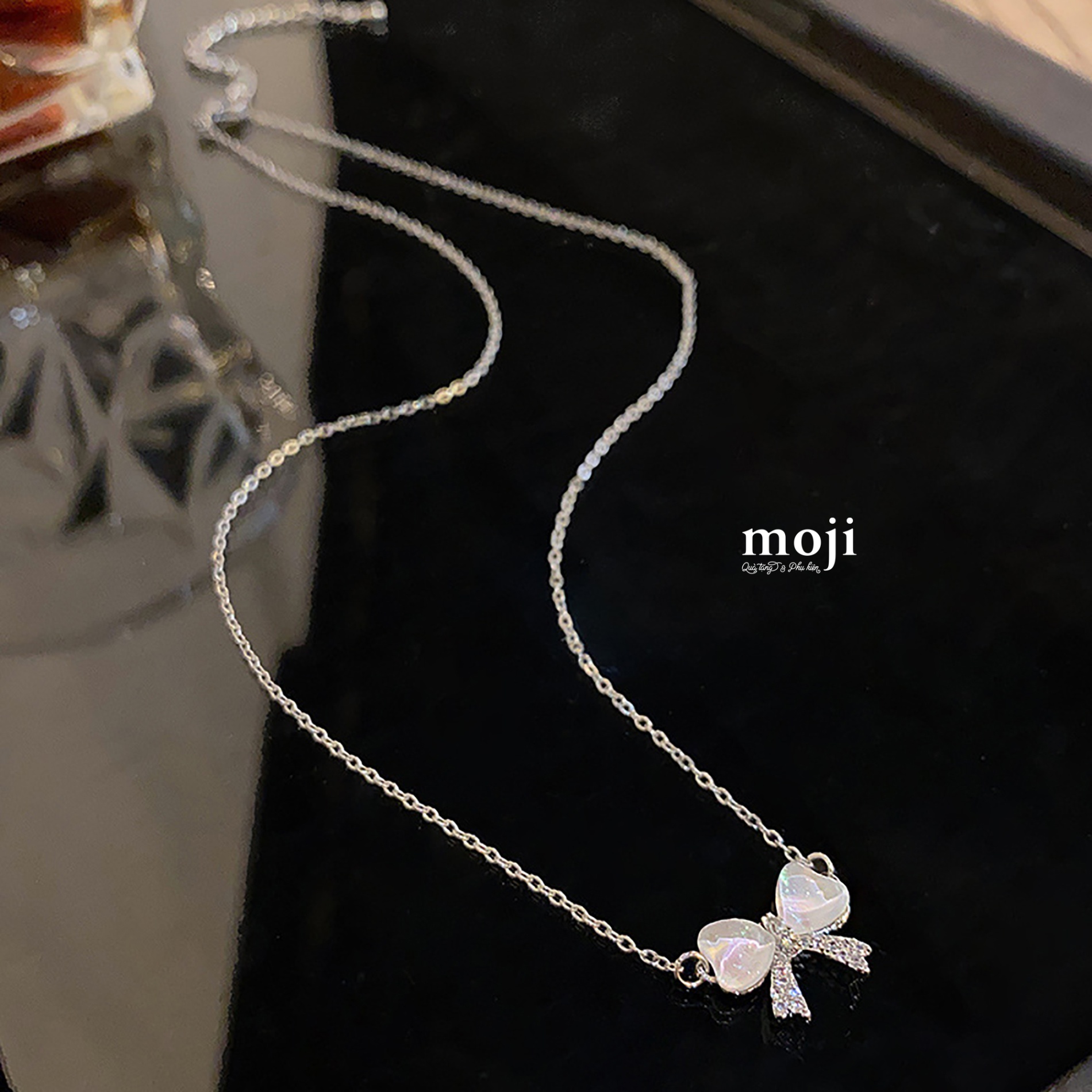 Dây chuyền mạ bạc Bow nơ đính đá lớn nhỏ