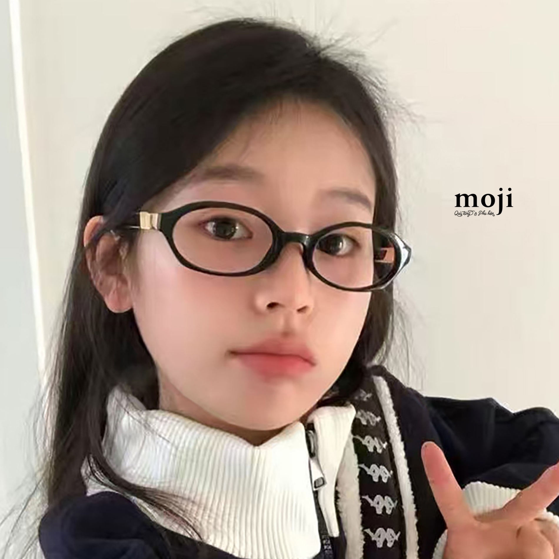 Kính gọng kim loại sọc chéo chân bọc nhựa