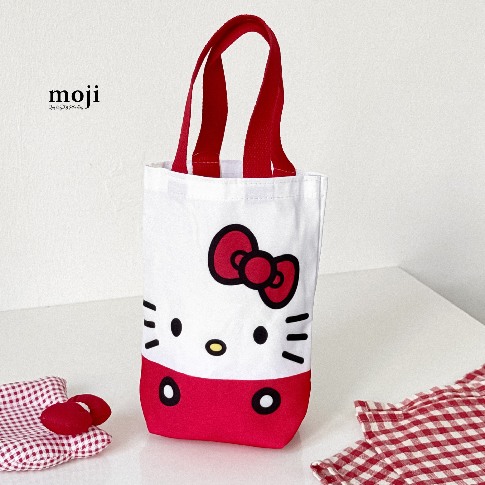 Túi đựng bình nước Sanrio family Hello Kitty face phối màu 18x23