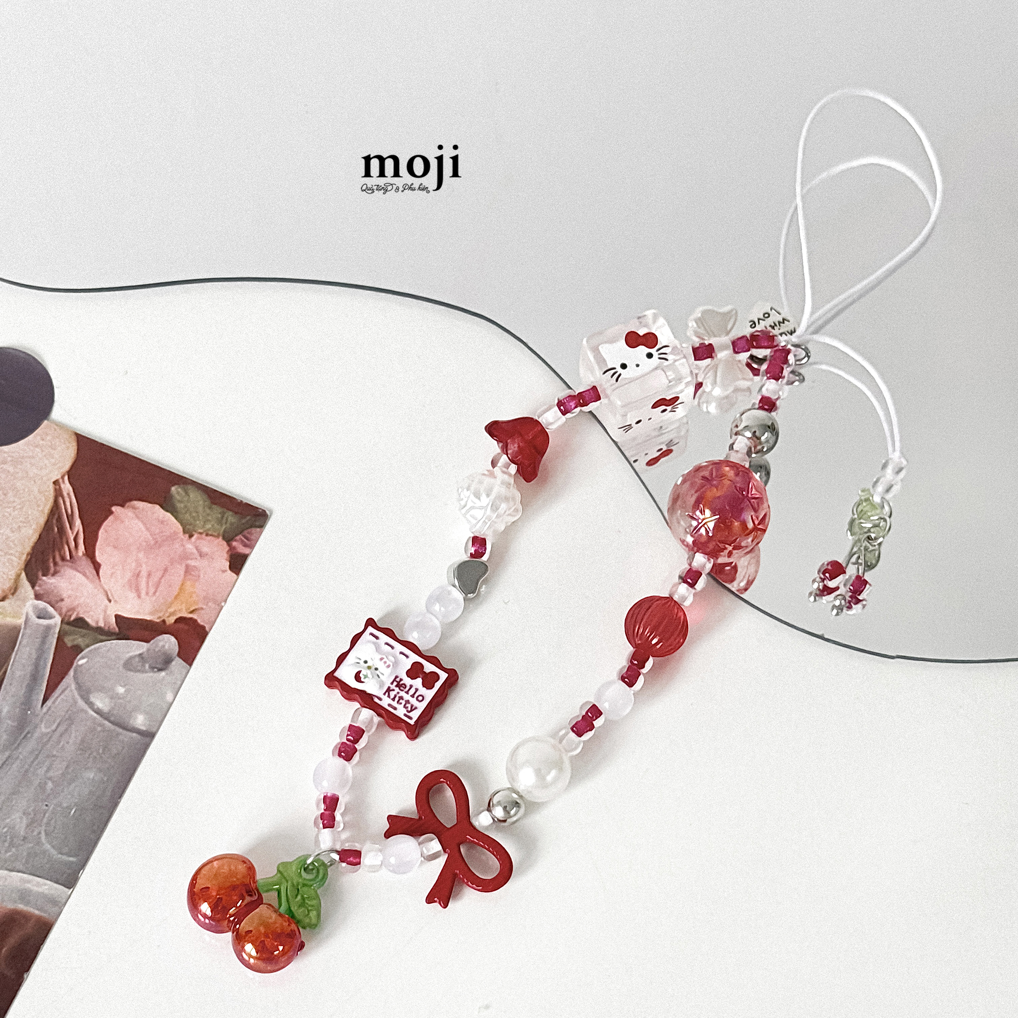 Dây đeo điện thoại Sanrio family Hello Kitty face fruit flower bow