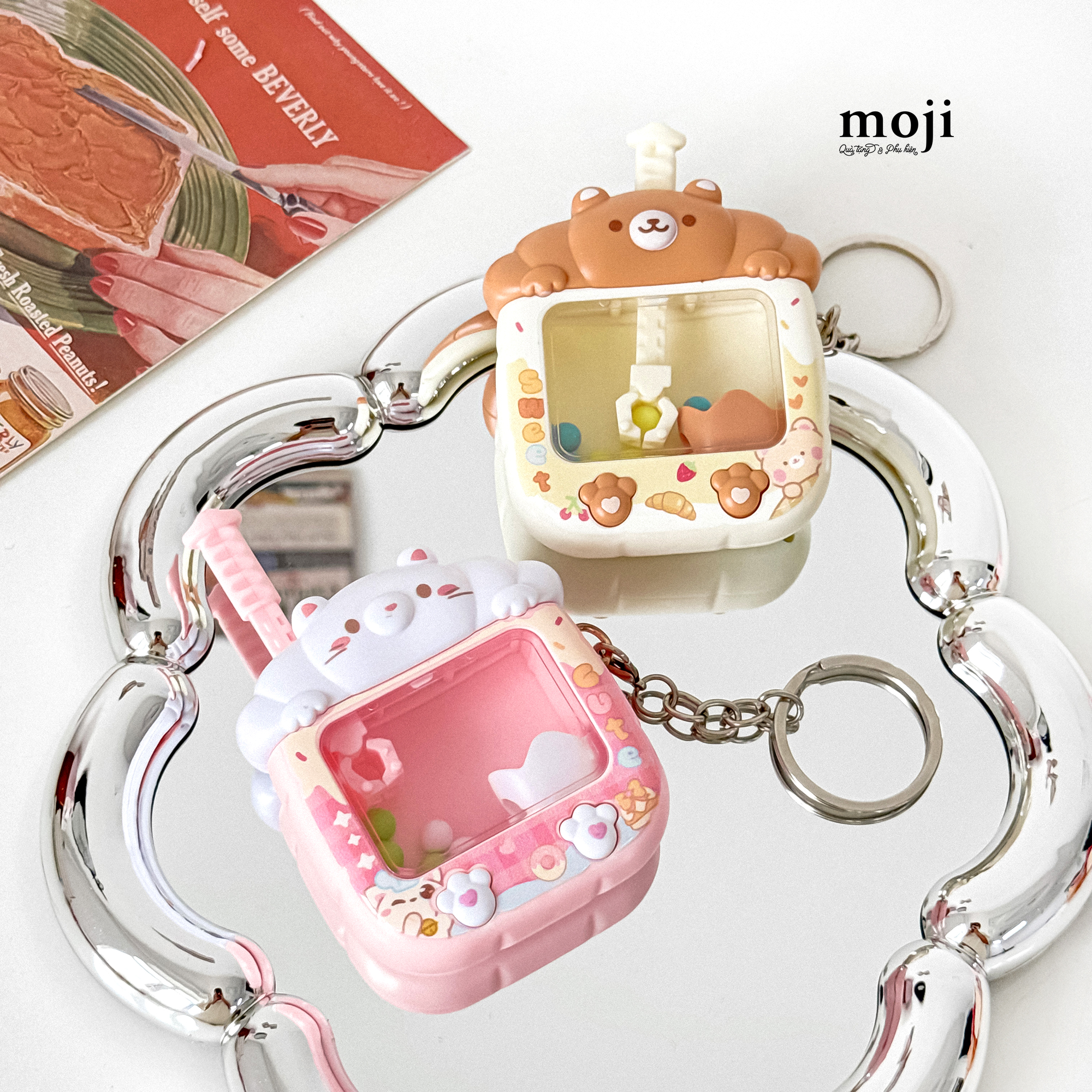 Móc khoá đồ chơi Máy gắp thú cưng bánh sừng bò