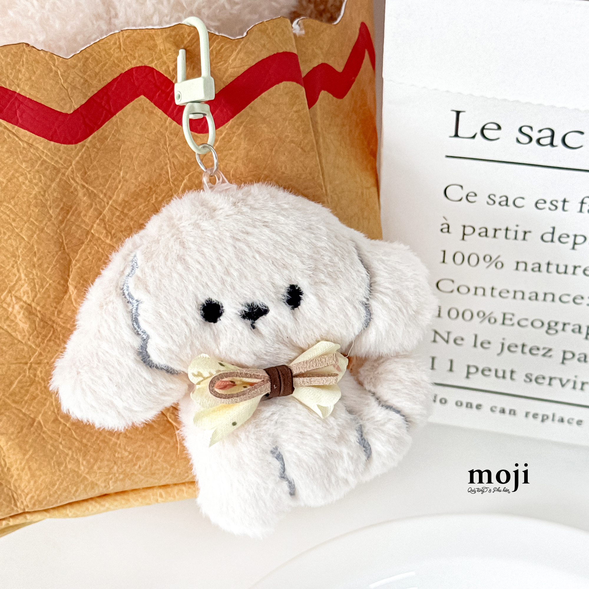 Móc khóa nhồi bông Cute dog đeo nơ